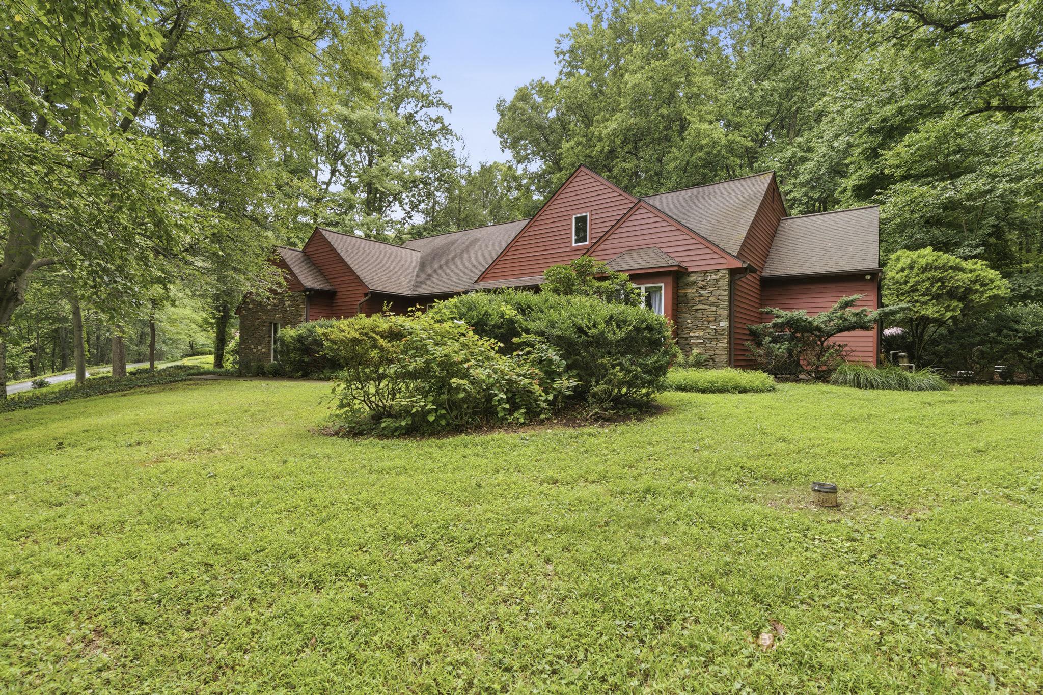 Rare opportunity to own a truly one-of-a-kind retreat where nature meets luxury living. This architecturally unique, custom-designed home backs directly to the Cromwell Valley Park — offering breathtaking, protected woodland views and the kind of seclusion most people only dream about. Yet you're just minutes from I-695, top-rated schools, Towson's restaurants, shops, and world-class medical facilities.
The unique floor plan features three primary bedroom suites — an extraordinarily rare offering perfect for multi-generational living, out of town guests, or those who simply demand the finest accommodations for family and visitors alike. Entertain in style with a sparkling pool overlooking your private wooded backdrop, or unwind in the stunning three-season room where birdsong and rustling trees replace the noise of everyday life. When it's time to work from home, retreat to the dedicated office den. When it's time to play, the club room delivers the ultimate man cave or entertainment space.
Every inch of this home has been designed for the family that wants it all — peaceful, private, and surrounded by nature, without sacrificing a single modern convenience. This is more than a home. It's a lifestyle.
