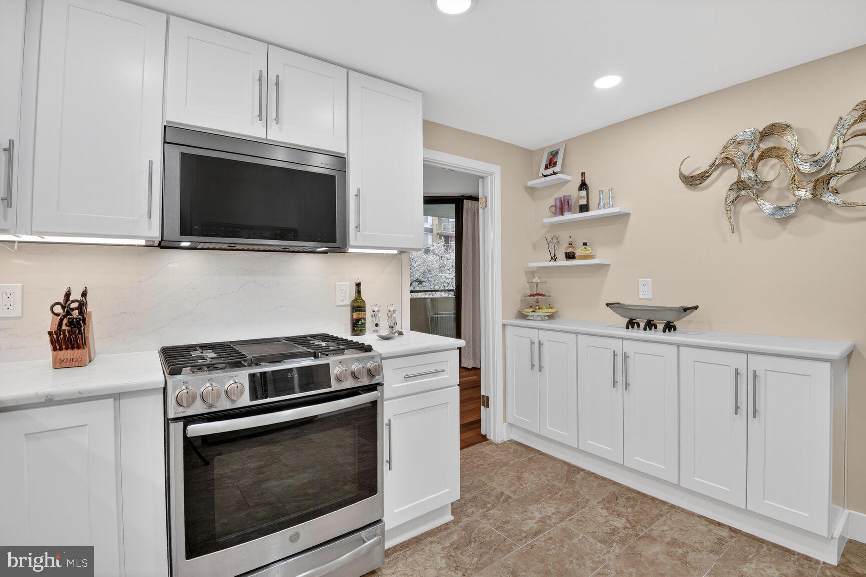 OPEN HOUSE Saturday 5/16 2-4pm. Beautifully remodeled 2 bedroom 2 bathroom unit of 1419 square feet in the sophisticated 4620 NORTH PARK AVE Condominium. This unit is completely turn-key, with updated flooring, renovated kitchen and bathrooms, custom recessed lighting and tray ceilings, custom closets, and plantation shutters. A laundry and utility room and balcony round out the unit.  The building is full-service and features excellent amenities: an outdoor seasonal pool, gym, outdoor seating, library, party room, modern lobby with front desk and doorman. Perfect location mere blocks from shopping, dining, public transportation, and bike paths. Building Fee covers ALL UTILITIES (AC, Electric, Water) and 24 hour front desk. Two parking spots and one storage unit included.  Cats are welcome.
