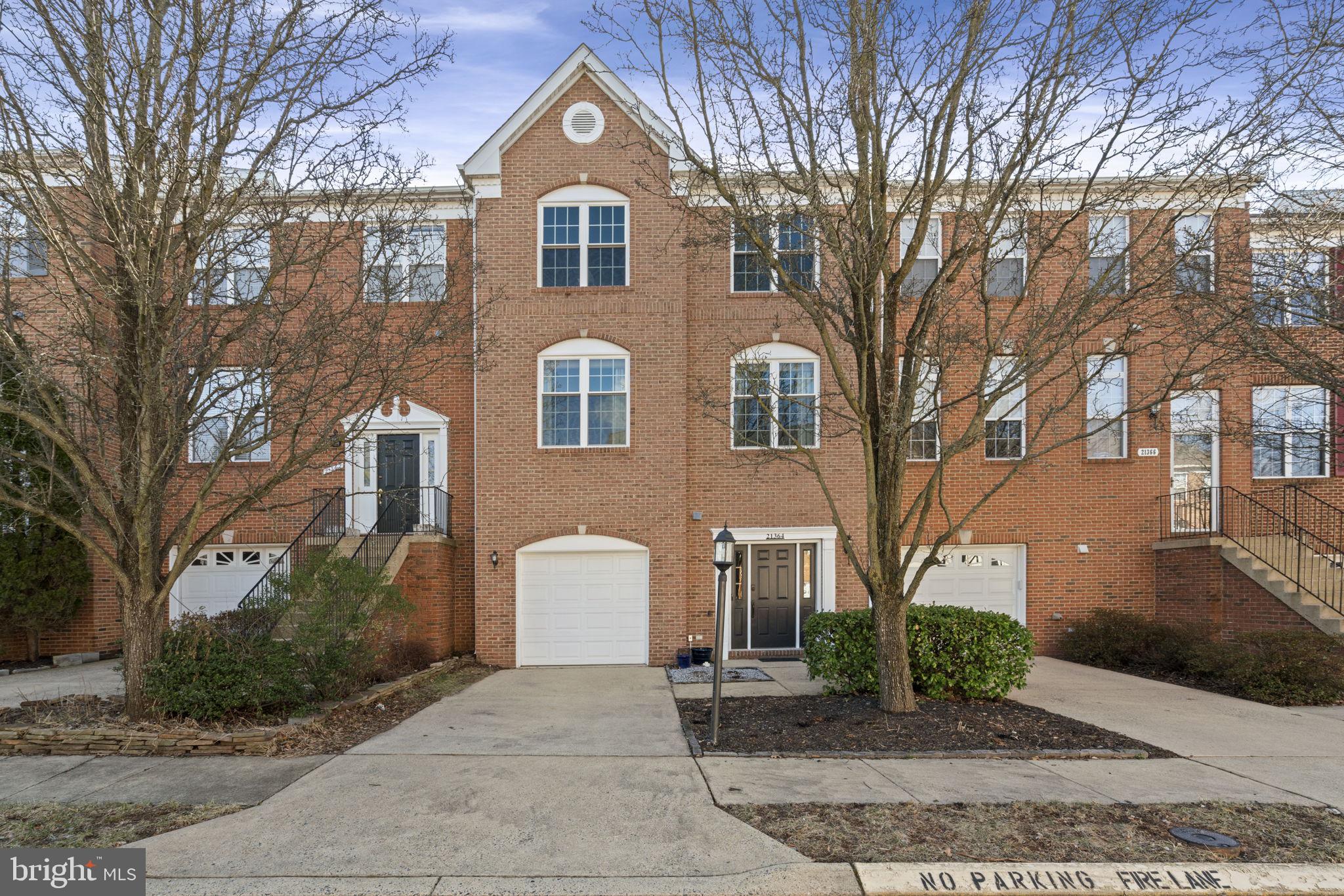 **ALL OFFERS DUE 3/8 AT 10PM** No detail has been missed, no update left incomplete. This updated, classic Colonial townhome is move-in ready with LVP flooring, fresh paint, newer appliances including dual zone HVAC and water heater, updated roof, added screened porch and improved deck, added/improved storage and closet organizers. This home is easily accessible to the Silver Line Metro (2 mi), highway access, and community amenities. Shopping, dining, and entertainment surround the community. The ground level of this home invites you with a lovely foyer, the one car garage access, the laundry & utility spaces, and the expansive Rec Room that opens to the covered patio and fenced backyard. On the mid-level, the open spaces of the Living Room-Dining Room combo and the Sitting Room-Kitchen combo with breakfast nook leads to the fabulous Screened Porch and deck. On the 2nd upper level you'll find 3 bedrooms with Vaulted Ceilings, and two beautifully updated Bathrooms. The ensuite primary bedroom features a large walk-in closet and luxury bathroom with seamless shower stall and soaking tub plus double vanities.  Don't miss the opportunity to see this house and make it your home!