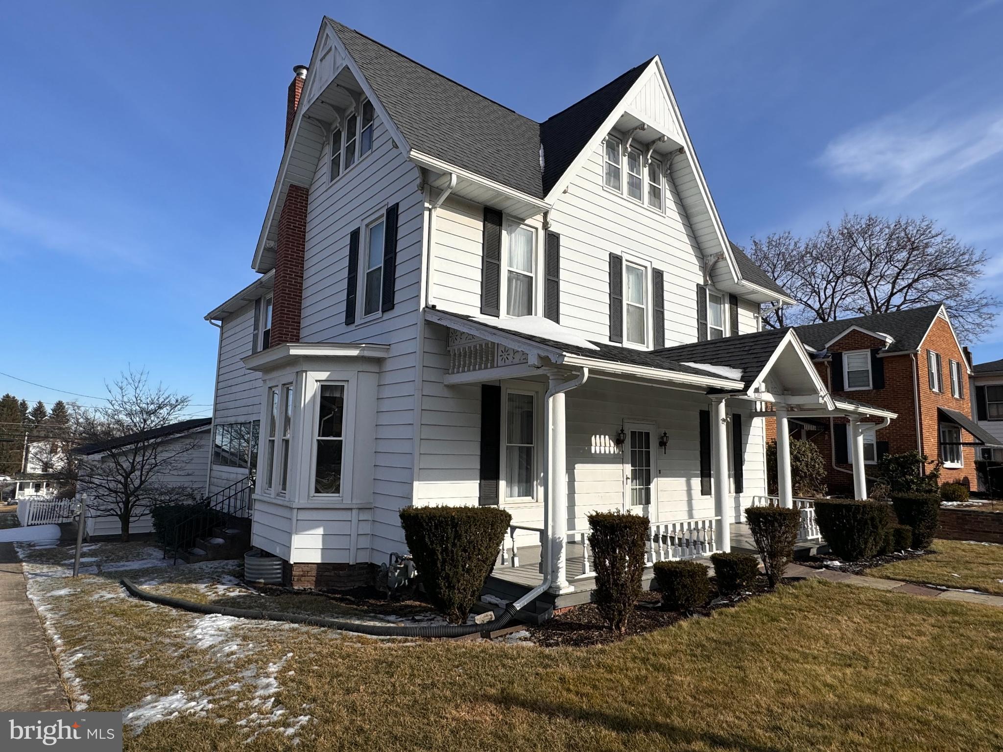 Step into history with this charming 1849 home in the heart of Lock Haven! Nestled on a quiet corner lot, this timeless beauty is filled with character and waiting to be brought back to life.    Inside, natural light pours through bay windows into the spacious formal living room—a perfect setting for holiday gatherings and cozy evenings. Beneath the current carpeting, original hardwood floors are just waiting to be revealed. The inviting dining room, conveniently located off the kitchen, features a second staircase to the upper level (easily reopened for added charm and accessibility). An enclosed sun porch offers the ideal retreat for morning coffee, reading, or simply unwinding.    The versatile family room can serve as a play area, hobby space, or whatever suits your needs. A first-floor bath and laundry add convenience to this historic gem. Upstairs, you'll find three generously sized bedrooms, each with walk-in closets, plus a full bath. The semi-finished third level provides endless possibilities—create a home office, den, workout space, or even an additional bedroom.    While this home holds incredible potential, it is ready for someone with vision to restore its former beauty. The full basement includes a walkout to a concrete patio, while the large deck overlooks the backyard, offering great outdoor entertaining space. A detached two-car garage completes this fantastic property.  

Located just minutes from Lock Haven University and all local amenities, this home is a rare find.  The motivated seller is ready to entertain offers.