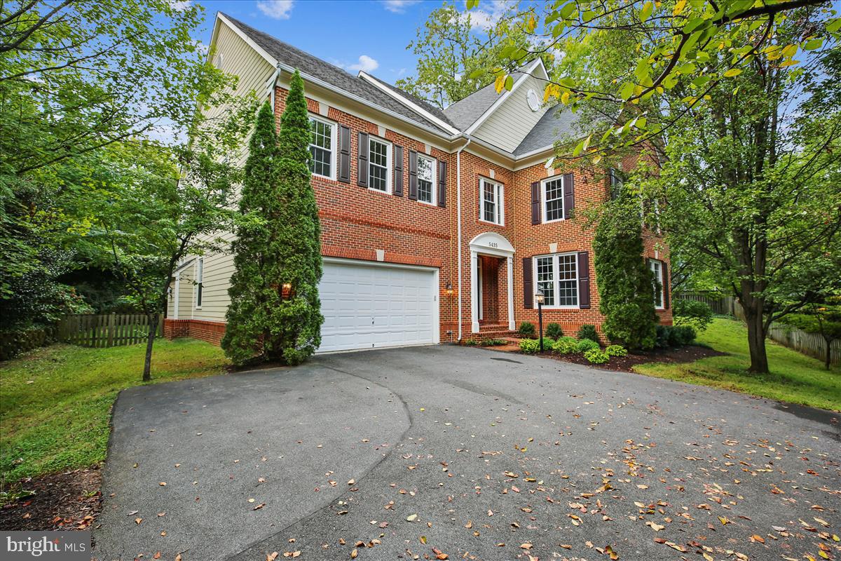This fabulous brick colonial is situated on an over-sized 13,000 sq. ft. lot, in the highly sought after Alta Vista subdivision. This home features over 5,000 sq. ft. of living space over 3 levels with 4/5 bedrooms and 4.5 bathrooms, an attached 2 car garage, and boasts gleaming hardwood flooring throughout both the main and bedroom levels. The elegant interior demonstrates tasteful finishes, crown molding, soaring ceilings, walls of windows, and recessed lighting throughout. Designed for entertaining with an open floor plan, the entry flows into the expansive living and dining areas surrounded by tall windows overlooking park-like gardens. The large eat-in kitchen has a SubZero refrigerator/freezer, granite counters and it opens to a large breakfast area which accesses the rear patio, and the Great Room with its high ceilings, gas fireplace, and a wall of tall windows. The grand staircase leads to a broad upper hallway providing access to 4/5 bedrooms and the upstairs laundry room. The Master Suite includes a tray ceiling and recessed lighting, a master bathroom with corner jet bath, separate his/hers vanities, and a separate over sized shower. The suite also includes a walk-in closet. Office with built-ins. A 2nd large bedroom includes an en suite bathroom, and the final two bedrooms share a Jack & Jill bathroom. The home's Lower Level is not to be missed with high ceilings, an expansive Recreation Room, full bath, large Fitness/Media Room and storage room with walk-up entrance to the rear yard. This home has also been freshly painted and had new carpeting installed. Easy access to I-495, I-270, walking distance to the YMCA and close to Downtown Bethesda. In the Walter Johnson High School District.