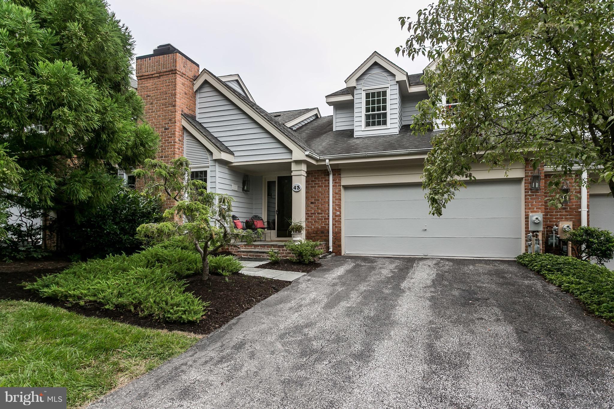 Rarely available 1st floor master with hardwood throughout the entire house.  New windows, sliders, dishwasher and oven.  Fresh paint throughout. Den w/ wood burning fireplace off kitchen. Bright LR w/ vaulted ceilings, wood burning fireplace and slider to fenced bluestone patio.  Sitting room overlooking LR.  2 large bedrooms upstairs w/ lots of closet space.  One year HMS Warranty included.