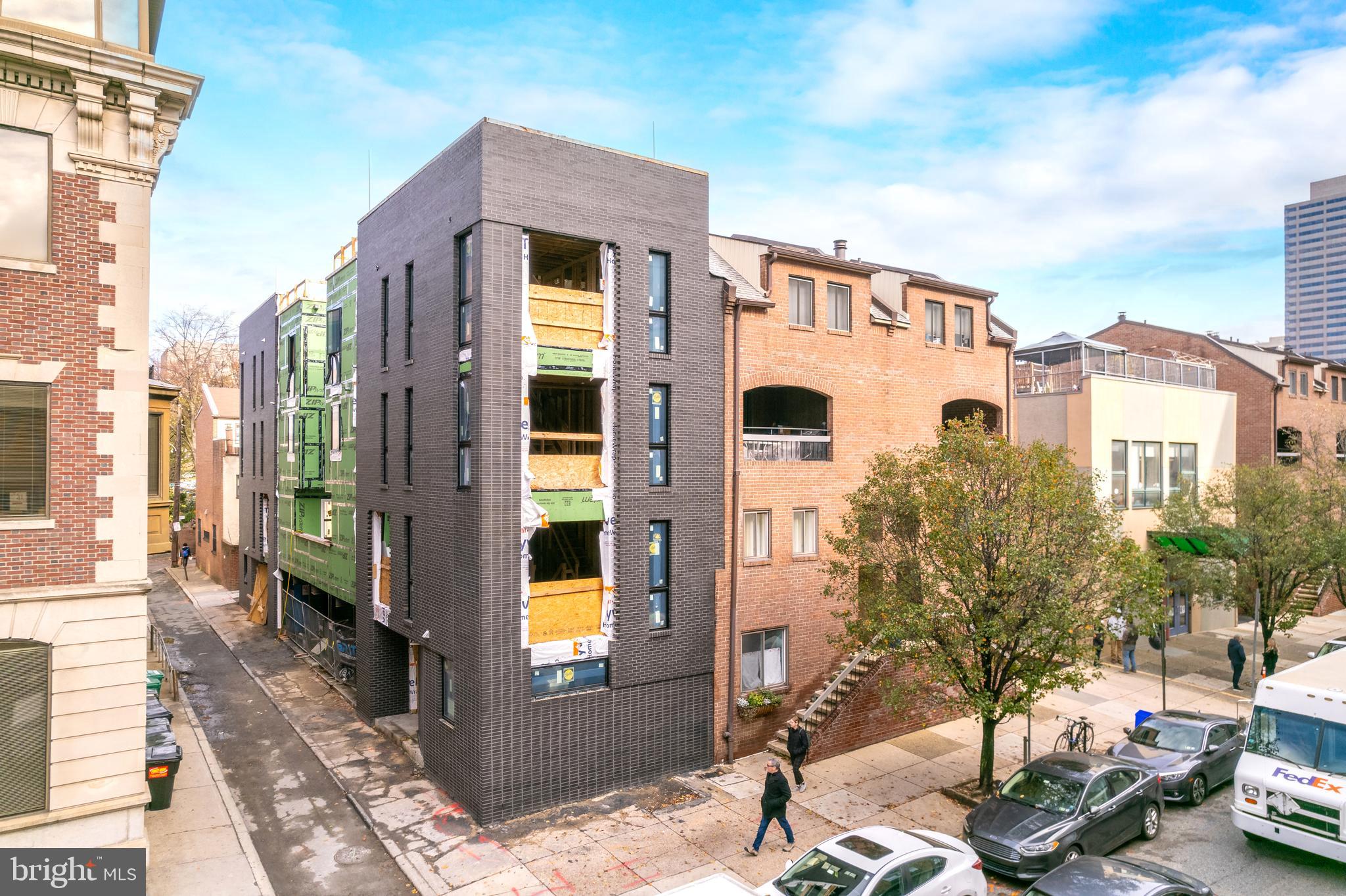 The Duo on Arch is a progressively designed pair of CORNER homes built in one of the Philadelphia's premier neighborhoods - Logan Square - featuring TWO car parking! These stunning homes will capture you from the moment you walk up. The handsome charcoal exterior will be contrasted by a stunning pivoted natural wood door. Upon entry you will walk into a nicely designed foyer space along with the 4th bedroom and full bathroom which could be a perfect office set up. The second floor is a wide open layout with a massive kitchen featuring custom Porcelanosa cabinetry, Bosch appliances and quartz counters as well as backsplash. The kitchen also leads you to your private deck allowing outdoor entertainment right off the main living area! Pass through the dining room into the expansive living room that is sun soaked. The sleek and modern corner fireplace captures your focal point while leaving plenty of space for furniture arrangement. The third floor conveniently holds the primary suite with huge bedroom, massive closet and a stunning designer bathroom with wet room, freestanding tub and double vanity. The fourth floor features two graciously sized bedrooms and beautiful bathrooms, plus laundry and wet bar. Last but not least, the stunning roof deck with perfect skyline views! Schedule your tour now - delivery Spring 2023. These homes include the FULL tax abatement applied for. *Association fees are TBD. It is the responsibility of the buyer to verify square footage and taxes.