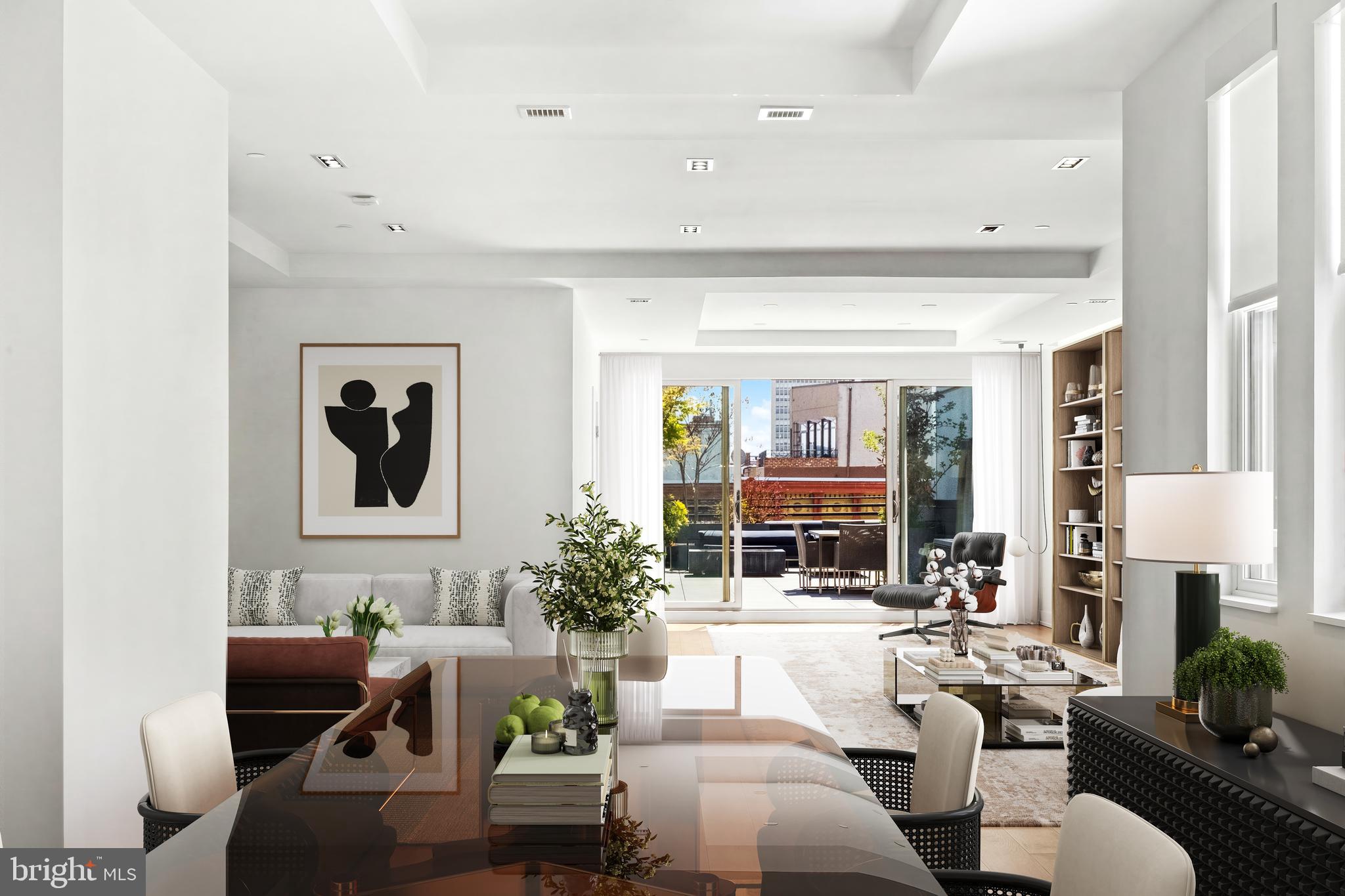 Set atop two meticulously restored turn-of-the-century industrial buildings in the heart of Old City, this trophy duplex is the kind of home that makes everything else feel like a compromise. With 3,556 square feet of interior living space and 1,267 square feet across two private terraces, PH-2 delivers a standard of space, light, and craftsmanship rarely found anywhere in the city.
The living level opens directly to a terrace overlooking Arch Street, where sweeping southern views of the skyline become part of daily life. The kitchen, designed by Idea Group and Record e Cucine, is a work of precision — custom Italian cabinetry, Wolf range, built-in coffee system, Sub-Zero refrigeration and wine preservation, and an Asko dishwasher. Every detail was chosen without compromise.
A custom white oak staircase ascends to the private upper level, where the primary suite occupies its own world — entirely separated from the secondary bedrooms, with a dedicated private terrace, two Pianca walk-in closet systems, and a five-fixture en-suite bath with radiant heat flooring and soaking tub. The Benjamin Franklin Bridge frames the view. The quiet is complete.
Completed in 2022, 115 Arch Street was designed for those who know exactly what they want — and refuse to settle for less. Deeded parking, private storage, smart virtual intercom access, and cold lobby storage complete the offering.

115 Arch Street is a premier conversion of two adjacent industrial buildings. In a testament to technological innovation, the property is equipped with a virtual intercom system for remote access. Owners enjoy private automated indoor parking accessed through the rear of the building. For added convenience, cold storage is available in the building lobby. 
This residence offers the significant advantage of a 7-year tax abatement. Deeded parking on the first floor with a rear garage entry and licensed storage room in the basement. Please note that a second deeded parking space is available at an additional cost off site.
Neither Seller nor Listing Brokerage warrants the accuracy of square footage, dimensions, lot size, room measurements, taxes, condominium information, or other property details. All information should be independently verified by Buyer and Buyer's representatives.
