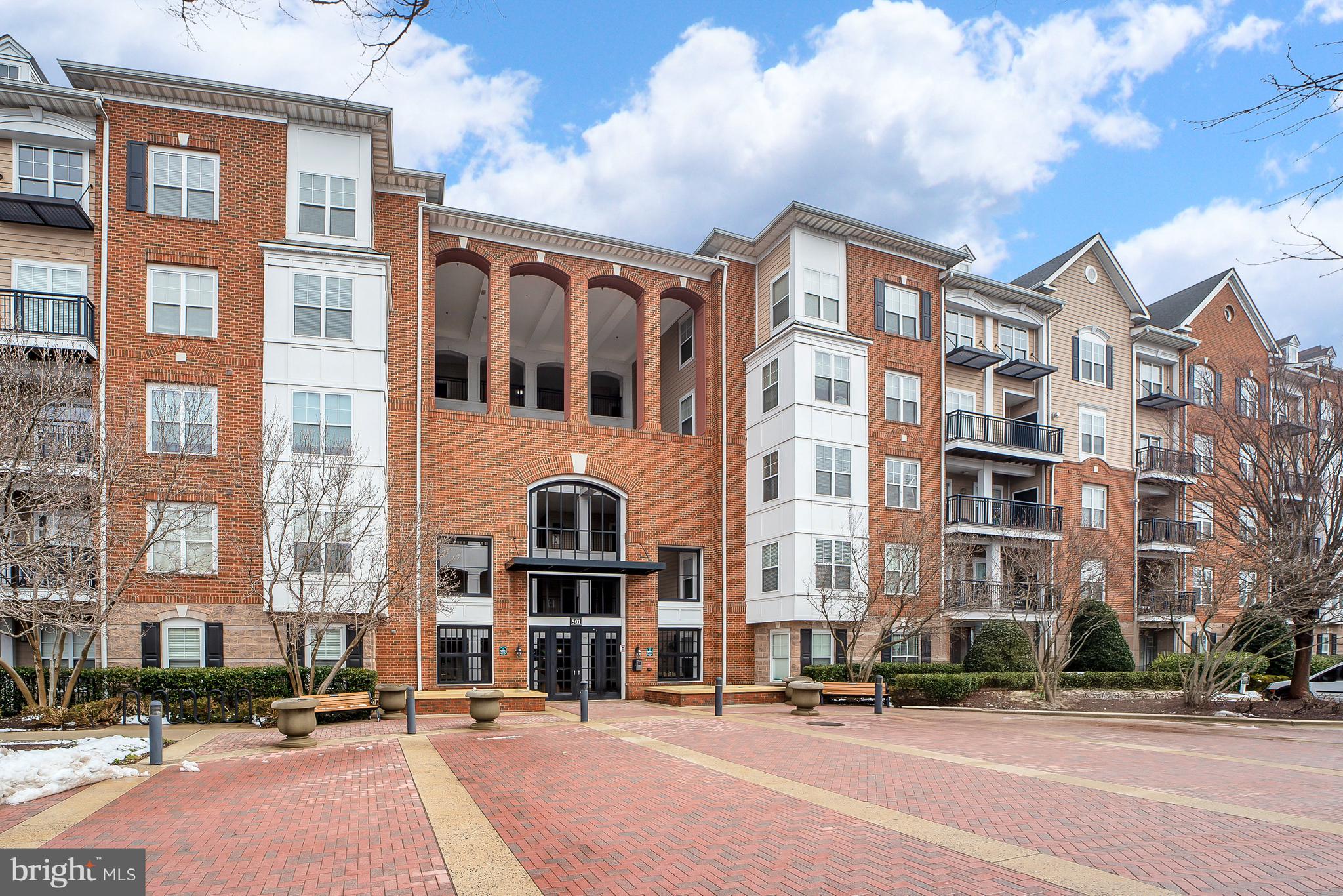 Welcome to The Fitz Condominium, a fantastic two-bedroom, two-bathroom unit offering nearly 1,200 square feet of stylish living space. Step into this wonderful condo and be greeted by hardwood flooring that can be found throughout the living area. The kitchen offers tile flooring, granite countertops, and stainless steel appliances including a brand-new dishwasher and range hood. The living area is bathed in natural light, thanks to oversized windows and a glass door that seamlessly leads to the deck. Recessed lighting enhances the space, while the eat-in area provides the perfect setting for dining and entertaining. One bedroom features dual closets and access to a full bathroom, complete with a shower-tub combination. For added convenience, this bathroom also connects directly to the living area. The second bedroom boasts a spacious walk-in closet and a private en-suite bathroom, also equipped with a shower and tub. An in-unit washer and dryer can be found in a closet, adding ease to your daily routine. Additionally, this condo includes two separately deeded parking spaces, offering the rare benefit of covered garage parking in such a sought-after location. The Fitz offers an array of exceptional amenities, including a community area with games and lounge spaces, a fitness center, and a refreshing outdoor pool perfect for warm-weather relaxation. This incredible location puts you just steps away from the vibrant shopping, dining, and entertainment of Rockville Center, as well as the endless conveniences of Rockville Pike. With everything this condo has to offer in such a prime location, it won’t be on the market for long. Don’t miss this fabulous opportunity to make this condo yours.