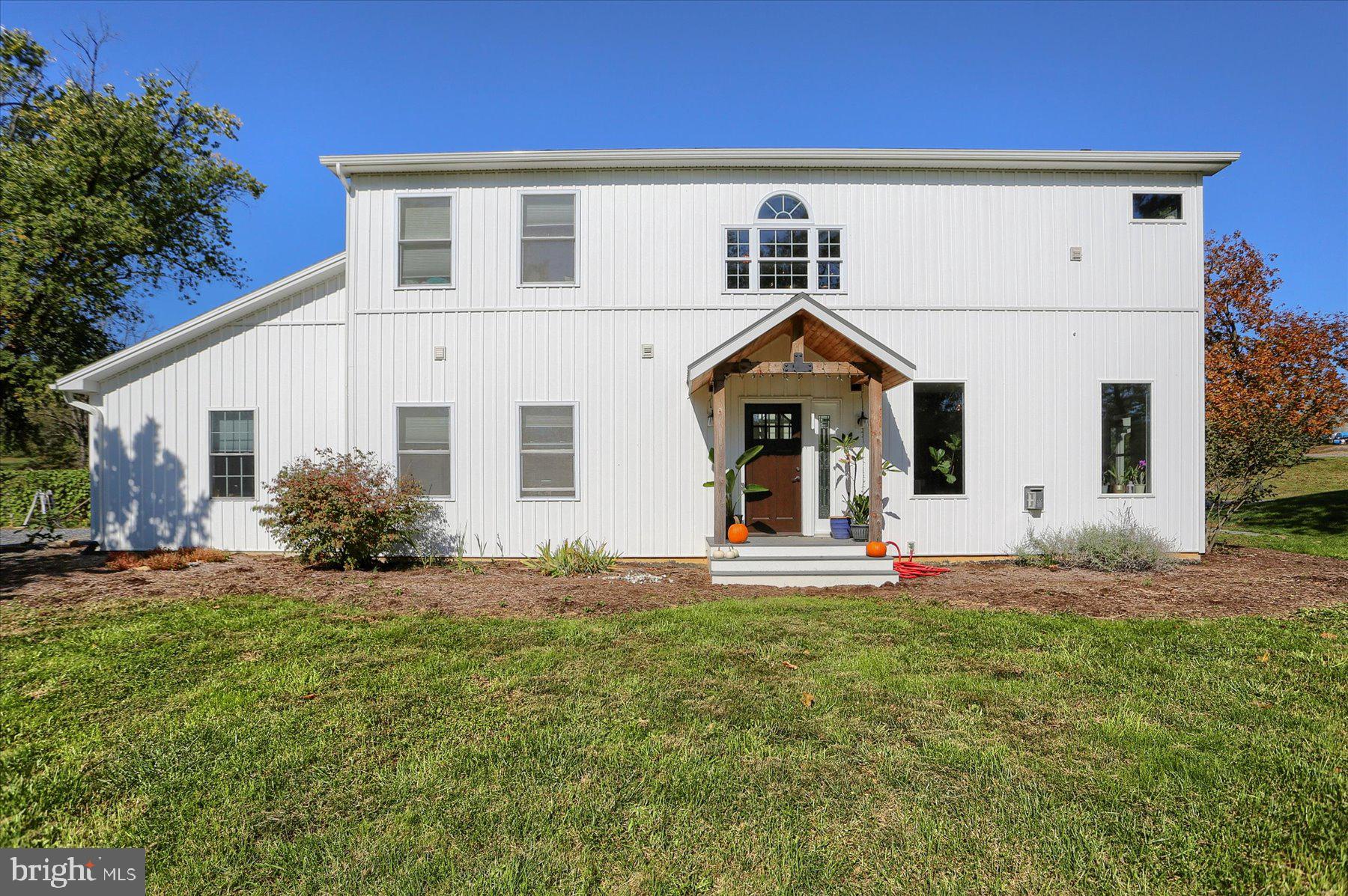 Nestled in a picturesque setting in the Cumberland Valley School District, you will find this lovely 4 bedroom, 3 and 1 half bathroom home located just outside of the historic towns of Boiling Springs and Churchtown.  There is a definite small-town feel that still provides easy access to all of the area amenities - fine dining, shopping, medical facilities, Rtes. 81 and 15, and more.  The home is located 2 minutes from Boiling Springs, 10 minutes to downtown Carlisle, Mechanicsburg or Dillsburg and 20 minutes from Harrisburg.  The home was built in 2014 and has been lovingly maintained and offers 2,200 square feet of thoughtfully designed living spaces throughout and includes an in-law suite with a separate driveway and entrance.  An upgraded kitchen, which is the heart of this home, has stainless steel appliances and tons of prep space, storage space, and a large walk-in pantry for added convenience.  The breakfast area is flooded with light from the sliding glass doors that lead to a covered patio, perfect for combining the outside space with the inside space.   Adjacent to the kitchen and breakfast area is an expansive family room that overlooks a 3-acre front yard complete with a "bubbling" spring and has a cozy gas fireplace which makes this open floor plan perfect for hosting memorable gatherings with family and friends.  Upstairs are 3 spacious bedrooms, including a primary suite featuring a huge walk-in closet with laundry facilities and lovely en-suite bathroom offering a spa-like retreat.  A 2nd full bath on this level is great for guests or family.   The main floor in-law suite with a separate entrance, bedroom, full bath and living area offers easy access for guests or multi-generational living.  Geothermal heating with central air insures highly efficient conditioning of the home.  This property offers 42 acres that provide unlimited opportunities for all of your outdoor pursuits.  The barn and the detached oversized three-car garage provide ample storage space for cars and toys or plenty of space for the avid hobbyist, mechanical enthusiast or car buff.   Also located within 2 hours of Philadelphia, Baltimore and DC, and just 3.5 hours to NYC, this could be a dream getaway destination or horse farm.  The current owners have organically farmed the property for the past 15 years (note: the farm is not a certified organic farm) and there is an irrigation system and miscellaneous other equipment - greenhouses are negotiable - if the purchaser wants to purchase a working farm.  This great property would be the perfect place to call home!