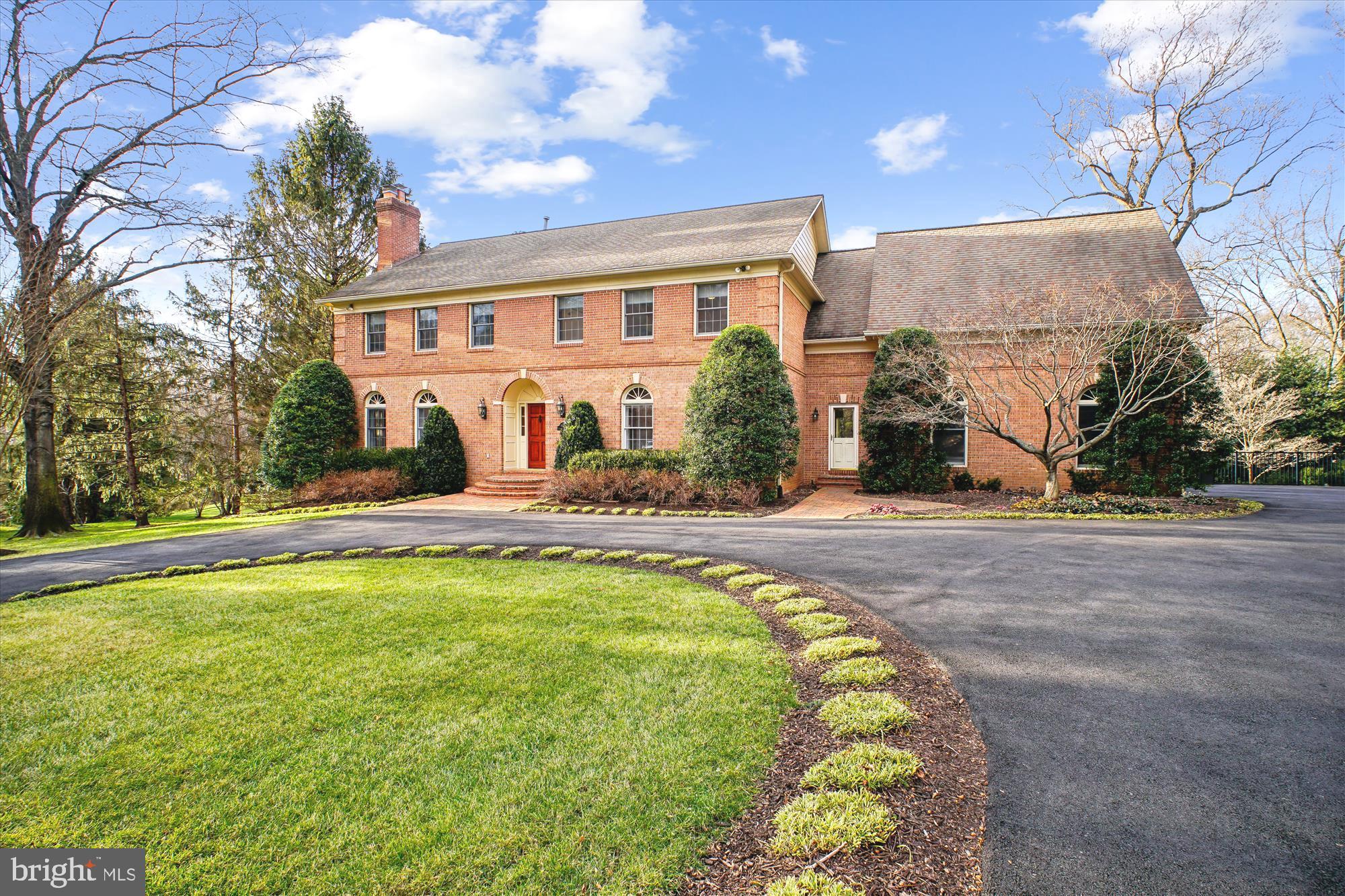 Welcome to your FOREVER home! This ALL BRICK ESTATE  HOME features a PRIVATE POOL and is situated perfectly at the end of a cul-de-sac in the sought-after SUMMERWOOD neighborhood.  The curb appeal shines with the home’s beautiful landscaping, circular driveway, 2 car side entry garage, and extensive hardscape. The covered entryway leads into an elegant foyer –  the attention to detail is everywhere.  To your left is the stunning living room with the first of FOUR (4) fireplaces in the home – a perfect space to welcome friends! To the right of the foyer is the formal dining room with elegant touches like solid brass sconces and custom millwork.  The family room has plenty of space for movie night, and a wood burning fireplace! NOTE- both wood burning fireplaces have gas lines if you want to convert. Two sliding doors lead from the family room to the expansive deck which lets in loads of natural light.  A dedicated home office is also on this level with double-door access from both the family room and living room and has custom built-in shelving.  On to the kitchen which you will LOVE!  It features a Thermador induction range & warming drawer,  built in Bosch refrigerator, a Bosch dishwasher, GE microwave, granite counters, and island for extra seating and a cozy built-in banquette.  It also has a walk out to the BEAUTIFUL covered porch where you will be sure to spend most of your mornings – the view is so peaceful and overlooks the pool and the private wooded view!   Also on the main level is a dedicated mudroom/drop zone with a separate front entrance, which has access from the garage and kitchen. It has loads of storage space and is perfect for kid stuff, dogs and more! The bonus rear staircase from the mudroom provides added convenience.  Also check out the freshly painted, oversized 2 car side entry garage with HEATER and EV CHARGER. .  Upstairs features four (4) bedrooms and three (3) full bathrooms.  The primary suite is stunning – it features a sitting room with a cozy fireplace and pocket doors to the primary bedroom space (also perfect for a second home office). The two walk-in closets are huge with built-in organization systems.  The washer dryer is in this space on your way to the primary bathroom. You will LOVE the added convenience of having the washer/dryer on the upstairs level and it has DEDICATED WATER HEATERS - the rest of the house is served by a TANKLESS WATER HEATING SYSTEM! The primary bathroom has tons of extras like a BRAND NEW STEAM SHOWER, AMBIENT HEAT FLOORS , dual vanities, a private water closet and jetted soaking tub.  The second bedroom is a junior suite with a NEWLY RENOVATED en suite full bathroom.  The additional two bedrooms share a renovated jack and jill bathroom with dual vanities and a private water closet/bath area.
The lower level has an outstanding gym space that features a cork floor underneath and wall of mirror. You will also find a full bathroom, a bedroom with a large closet, and a LARGE recreation room with a bar area (including a mini fridge, dishwasher, sink) and a wood fireplace.  Sliding glass doors let in natural light and lead out to the incredible back yard.  GAS HEATED PRIVATE POOL is the showstopper! BRAND NEW RETRACTABLE COVER. Multi-level deck perfect for entertaining, and the beautiful covered porch. It is also fully-fenced with high end fencing and gorgeous landscaping both front and back – the owners have taken great care of this spectacular home!  Please see documents for a comprehensive list of all the improvements as well as the floor plan and interactive tour.   The location is unbeatable—Summerwood offers NO HOA, tree-lined streets, and sidewalks, while being close to Spring Hill Elementary and Spring Hill Rec Center with indoor pool, fields, and programs. Commuters will love the easy access to I-495, Route 7, Dulles Toll Road,  2 miles from the Silver Line Metro,  minutes to Tysons Corner.  LANGLEY HS, COOPER MS, SPRING HILL ES.
