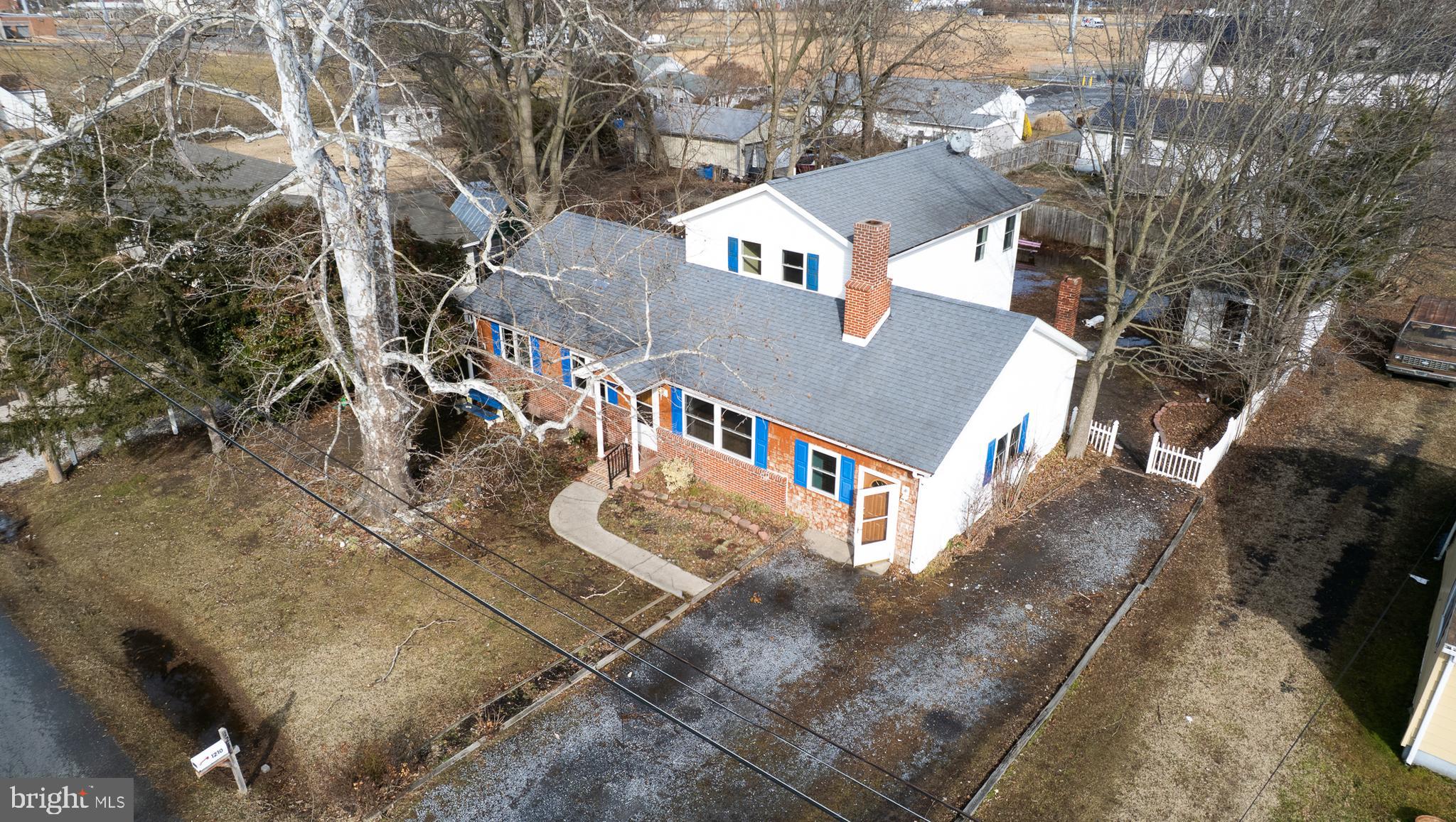 NOW ACCEPTING FHA FINANCING!! Discover space, flexibility, and opportunity at 1210 Stone Boundary Rd in Cambridge! This spacious 3-bedroom, 2-bath rancher with a versatile upstairs addition offers room to grow and endless potential — all priced under $300,000. The main level features a welcoming open-concept kitchen, living, and dining area ideal for everyday living and entertaining. Enjoy cozy evenings around the wood-burning fireplace or spread out with a second family room offering additional space for relaxing, hobbies, or gatherings.

Upstairs, a fully equipped in-law suite includes its own kitchen, bedroom, and full bath — perfect for multi-generational living, extended guests, or flexible living arrangements. While the home is ready for updates and personal touches, the layout, square footage, and functional design create an incredible opportunity to build equity. Outside, the quiet fenced backyard provides a private setting ideal for families, pets, gardening, or entertaining.

Sellers are very motivated and offering a $5,000 credit toward flooring — a fantastic opportunity to customize the home to your style while adding immediate value.

Conveniently located near local shopping, dining, waterfront attractions, and commuter routes, this property combines space, versatility, and affordability rarely found at this price point. Bring your vision and make it your own!
