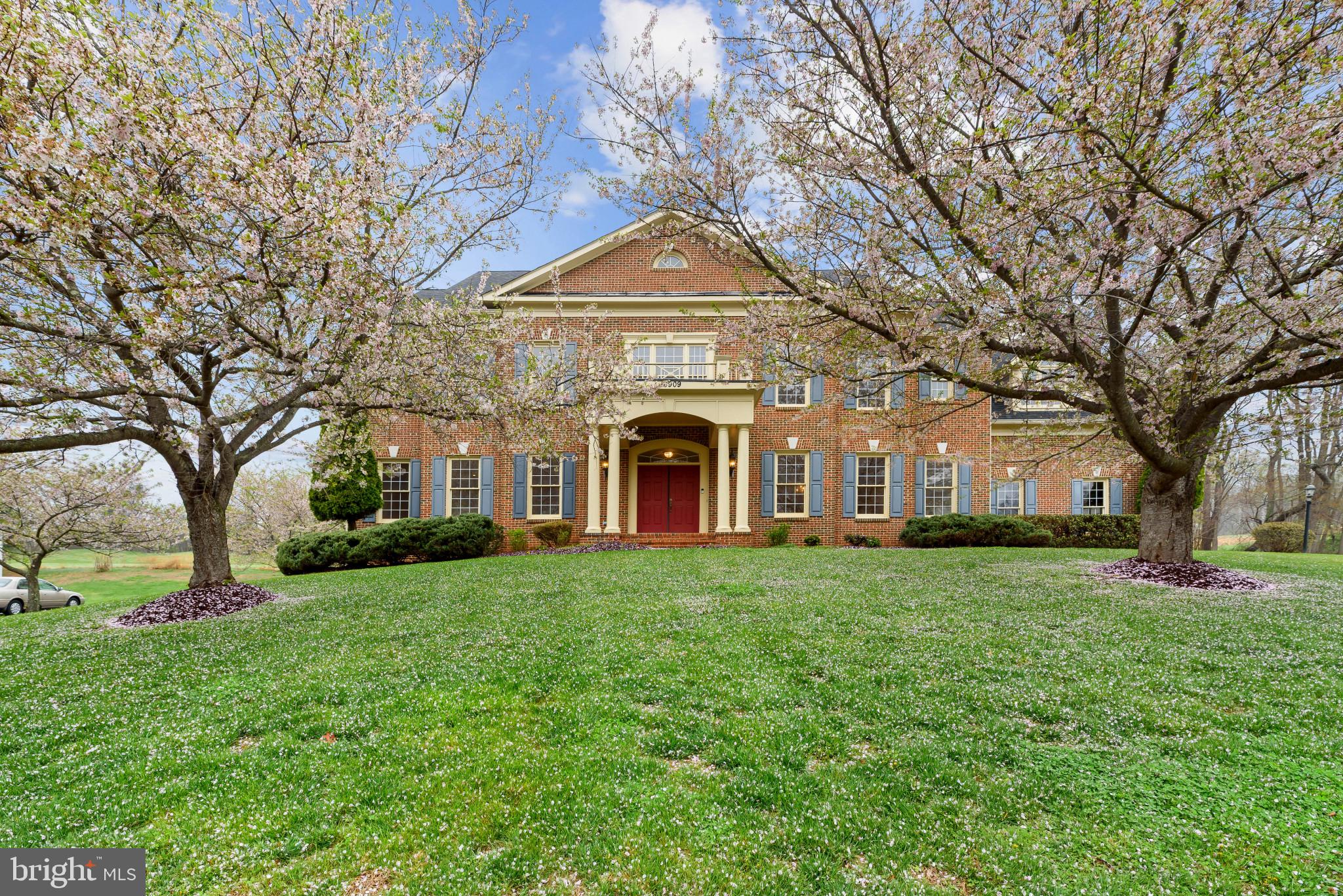 Welcome to the Big Boy on the Block!!  This is one of the largest homes in Hampshire Greens. Boasting over 9k sqr ft with 8 large bedrooms and 8.5 baths.  The owner had added custom extensions and bump outs to make this home as expansive as possible including a 4 car garage. Some of the extras include a brand new commercial grade gas stove and matching SS Fridge. Primary Bathroom has a special Steam Shower separate from the soaking tub and double vanities. Main floor hosts an In-Law Suite and full bath, Brazilian Cherry Floors, oversized morning room off kitchen. Lower lvl large bedroom and full bath along with a Kitchenette-Bar area and Theater Room. 5 bedrooms make up the upper lvl each with their own full bath including a massive Primary BR. Loft to 4th Lvl includes the 8th bedroom  with full bath and bonus room. Designer deck with raised area for a gazebo and views of the 6th hole fairway of Hampshire Greens GC.  Freshly painted and ready for your family to make new memories!