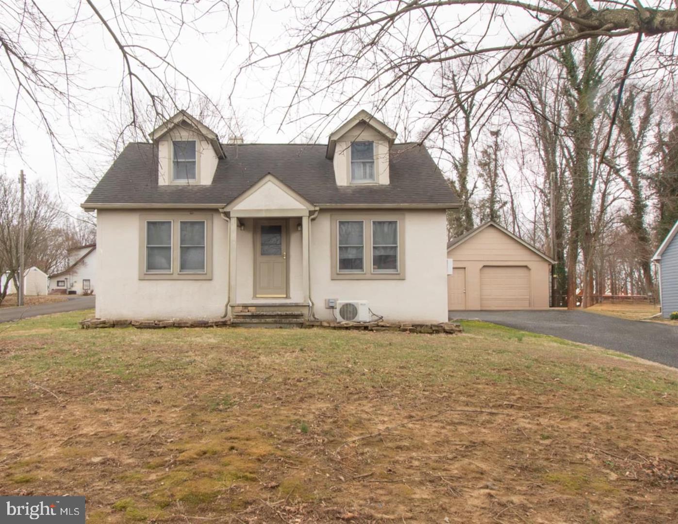 This charming Cape Cod-style home, built in 1946, offers 3 bedroom 1 bath. The interior features a traditional floor plan with hardwood flooring throughout, enhancing the warmth and character of the home. The combination kitchen and dining area is perfect for gatherings, while the full basement provides ample storage and laundry.  Set on a generous 0.36-acre lot, the property boasts a serene wooded backdrop, ensuring privacy. Parking is convenient with an attached carport and a detached garage. This home benefits from proximity to local parks, schools, and essential public services, fostering a strong sense of community. Enjoy the convenience of nearby amenities while relishing the quiet charm of this delightful property.