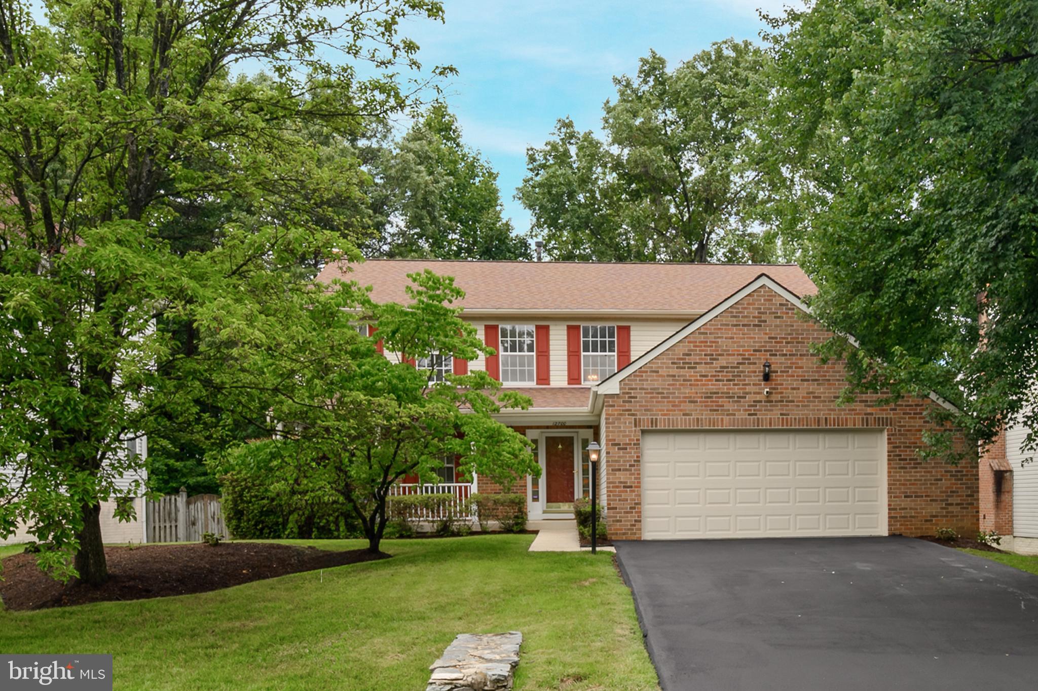 Beautifully prepared for the market and located in the sought-after Northridge community of Bowie, this spacious Colonial offers a classic design, generous living spaces, and a wonderful setting surrounded by well cared for homes and mature landscaping. From the moment you enter, the grand two-story foyer makes a memorable first impression with refinished hardwood flooring and an open upper-level overlook. The traditional layout features formal living and dining rooms off the foyer, offering timeless spaces for gatherings and entertaining. The heart of the home is the spacious kitchen with a casual dining area that opens seamlessly to the impressive family room featuring a cozy fireplace and plenty of room to relax. Just off the kitchen, you’ll also find a convenient main level laundry area and half bathroom.

A sliding glass door leads from the family room to the oversized refinished deck with built-in seating, creating the ideal space to enjoy the peaceful wooded views. The backyard overlooks City of Bowie preserved land, providing a beautiful natural backdrop and added privacy. Upstairs, you’ll find four generously sized bedrooms with fresh paint and newly installed carpeting, including the spacious primary suite featuring soaring ceilings and a spa-inspired en-suite bathroom. The renovated hall bathroom showcases a modern walk-in shower.

The finished walk-out lower level expands the living space even further with a huge recreation room featuring Berber carpeting, fresh paint, two versatile bonus rooms, and a full bathroom, offering endless options for guests, hobbies, a home office, fitness space, or additional living areas. With fresh updates throughout, a wonderful layout, and a premium Northridge location, this home is truly move-in ready!
