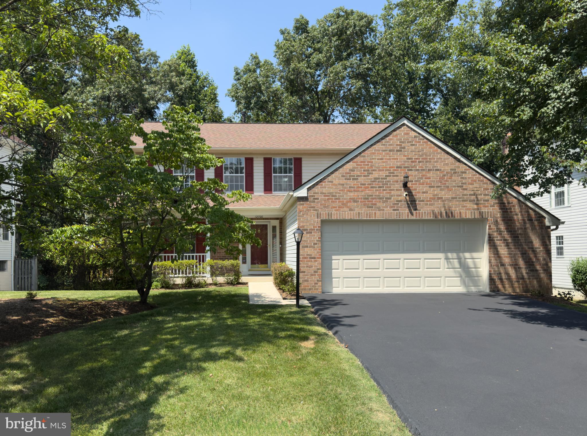 Beautifully prepared for the market and located in the sought-after Northridge community of Bowie, this spacious Colonial offers a classic design, generous living spaces, and a wonderful setting surrounded by well cared for homes and mature landscaping. From the moment you enter, the grand two-story foyer makes a memorable first impression with refinished hardwood flooring and an open upper-level overlook. The traditional layout features formal living and dining rooms off the foyer, offering timeless spaces for gatherings and entertaining. The heart of the home is the spacious kitchen with a casual dining area that opens seamlessly to the impressive family room featuring a cozy fireplace and plenty of room to relax. Just off the kitchen, you’ll also find a convenient main level laundry area and half bathroom.

A sliding glass door leads from the family room to the oversized refinished deck with built-in seating, creating the ideal space to enjoy the peaceful wooded views. The backyard overlooks City of Bowie preserved land, providing a beautiful natural backdrop and added privacy. Upstairs, you’ll find four generously sized bedrooms with fresh paint and newly installed carpeting, including the spacious primary suite featuring soaring ceilings and a spa-inspired en-suite bathroom. The renovated hall bathroom showcases a modern walk-in shower.

The finished walk-out lower level expands the living space even further with a huge recreation room featuring Berber carpeting, fresh paint, two versatile bonus rooms, and a full bathroom, offering endless options for guests, hobbies, a home office, fitness space, or additional living areas. With fresh updates throughout, a wonderful layout, and a premium Northridge location, this home is truly move-in ready!