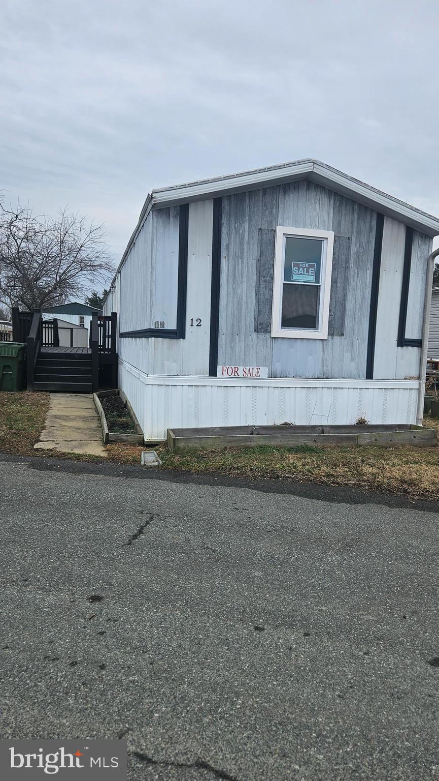 Discover this beautifully renovated 3- Bedroom, 2-Bath Modular home located in the desirable Fox village Subdivision. With generous space throughout, this home features elegant granite counter tops and convenient washer and dryer hook ups.  Close to Stafford market shopping center and various shopping options. This is a fantastic opportunity to own a hidden gem at a great price. Don't miss out on this chance to make it your own!   Contact us today for more information or to schedule a viewing!

Don't Let Financing stop you us for specific information! 
Ground Rent Fee  $1,100.00