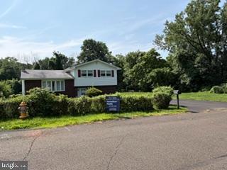 Welcome to 3001 & 3005 Century Ave. This property has so much to offer with it's close proximity to I-95 and PA Rt 413. The side lot is perfect for parking your boat or RV, those in the landscaping business, contractors and families looking for room to garden & play!
Inside you will find a half bath, fireplace in the downstairs den &  sliding glass doors to the outdoor covered patio. The first set of stairs take you to the open living room with hardwood floors & a beautiful bay window overlooking the front yard. Enter the eat in kitchen, with plenty of room for a farmhouse table or island to accommodate the chef and plenty of guests! A door in the kitchen leads to the expansive backyard. Upstairs you will find a hall bath with newer tub surround and 3 generous sized bedrooms, all with ceiling fans. While some upgrades are needed, the possibilities are endless!