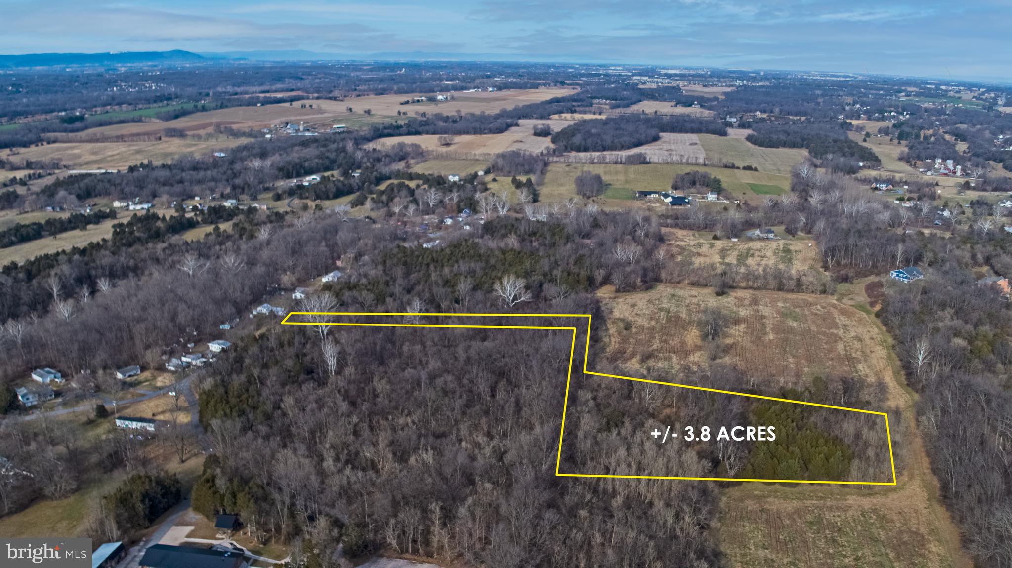 ✨ Discover Your Perfect 6.35‑Acre Wooded Retreat in Beautiful Williamsport, Maryland ✨

If you’ve been searching for the ideal blend of privacy, natural beauty, and convenience, your search ends here. This 3.84‑acre wooded lot— with an address of 8045 Avis Mill Road—offers the rare opportunity to build your forever home in one of Washington County’s most scenic settings.

Surrounded by mature trees and tucked away from the noise of everyday life, this property delivers the peaceful lifestyle so many buyers crave. Imagine waking up to mountain views, ending your days with spectacular sunsets, and enjoying nature as your daily backdrop. Whether you’re planning a custom home, a private retreat, or a place to simply breathe, this land offers the space and serenity to make it happen.

A perc test is needed, giving you the freedom to design your homesite exactly the way you want it. With A(R) Agricultural (Rural) zoning, you’ll enjoy flexibility for residential living, small‑scale agricultural uses, and even the potential to create your own private hunting spot—deer and other wildlife are known to frequent the area.

Location is everything, and this property delivers on all fronts. You’re just minutes from Hagerstown, where shopping, dining, and entertainment are at your fingertips. Commuters will appreciate the quick access to Route 70, making travel to Washington, D.C. or Baltimore surprisingly easy. It’s the perfect balance of country living with city convenience.

Bring your own builder and let your imagination take the lead. Whether you envision a cozy cabin, a modern farmhouse, or a luxury estate tucked into the trees, this land is ready to become something truly special.

Opportunities like this don’t come around often. Schedule your private tour today and start planning the life you’ve always wanted.

Soil analysis revealed that an above-ground septic system would be required. 

"Per the county, We have noted in the subdivision file that the lots all tested at 30 minutes for satisfactory trenches, but there are no details.

In that scenario, which is common for older perc tests, our staff would likely need to do a soil survey (AKA "mini perc") to gather more information."

A PRELIMINARY SOIL TEST EVALUATION HAS BEEN COMPLETED OF THE SRA ON THE PROPERTY INDICATING THE NEED FOR AN ABOVEGROUND SYSTEM. SOIL EVALUATION WAS DONE BY TRACY LEACH, A SOIL SCIENTIST WITH MARYLAND LAND SERVICES.