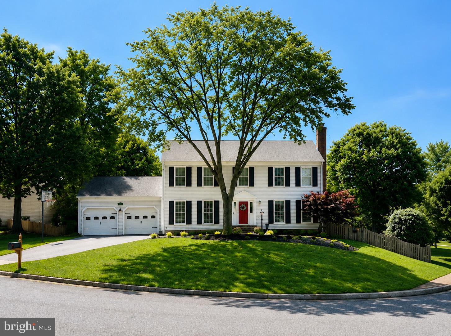 ******OPEN HOUSE Sat 7/18      1pm - 3pm *********  !!!!!PROFESSIONAL PICTURES COMING 7/15!!!!!
Perched atop a gently sloping knoll, this timeless, center-hall colonial sits on a large, corner lot with a gracious front lawn. Tucked into a quiet nook of Little Rocky Run and set on a low-traffic cul-de-sac just minutes from everything. This beautifully maintained home offers some unique features including dual fireplaces, generous room sizes,  a deep & oversized finished two-car garage, and inviting outdoor spaces designed for easy, everyday living.  New roof (2023) & gutter guards, PVC wrap on exterior trim, new brick stoop (2020) and concrete walkway (2025). The  main level features hardwood flooring, recessed lighting and detailed moldings throughout, including crown molding, chair rail and wainscoting. The floor plan offers ample room for family and friends, with a large kitchen adjoining the family room, a formal living room, and a bright and spacious dining room just off the kitchen. Updated kitchen with granite countertops, marble tile backsplash, new induction cooktop on the large island, new double convection ovens, stainless steel appliances & updated pendant lighting and hardware. Outdoor living is easy with maintenance-free Trex deck stairs, paver patio space for family meals or entertaining, and a fully fenced backyard for privacy and security.  Just a block or so from neighborhood amenities, including the pool, Union Mill Elementary School, trails, pickleball & tennis courts. Upstairs, the home offers 4 generously sized bedrooms with updated ceiling fans and brand-new, high quality carpeting. Spacious primary suite with newly renovated bathroom and large walk-in closet. Primary suite bath features 82” double vanity with quartz countertops, new flooring and newly tiled shower (glass doors to be installed July ’26) with custom river rock shower floor, elegant designer bathtub,  light fixtures and mirrors.  Secondary hall bath upstairs with double vanity, newer tile floor & shower as well as updated fixtures. 
Lower level with engineered hardwood flooring,  full bathroom (with new exhaust fan) and 21 new LED recessed lights expand the versatile living space. Designated office space with a wall of shelving, and an additional room ideal for a workout space, hobby room, or guest overflow. Sound-proof insulation in the basement ceiling provides added separation between levels, making the lower level especially useful for recreation, work, or multi-purpose living while keeping backyard access easy.  Conveniently located on a desirable, corner lot entering a quiet cul-de-sac, with spacious front and side yards, neighborhood block parties and year 'round activities. This gem has been well maintained and updated and is ready for it’s next chapter! Transferable Home Warranty w/ AHS for peace of mind for all major systems. Just steps from the Elementary school, community pool/tennis/amenities and easy access to Braddock Rd, Fairfax County Pkwy, Rtes 28, 29 & I-66, Little Rocky Run is a premier Clifton neighborhood that you’ll never want to leave!