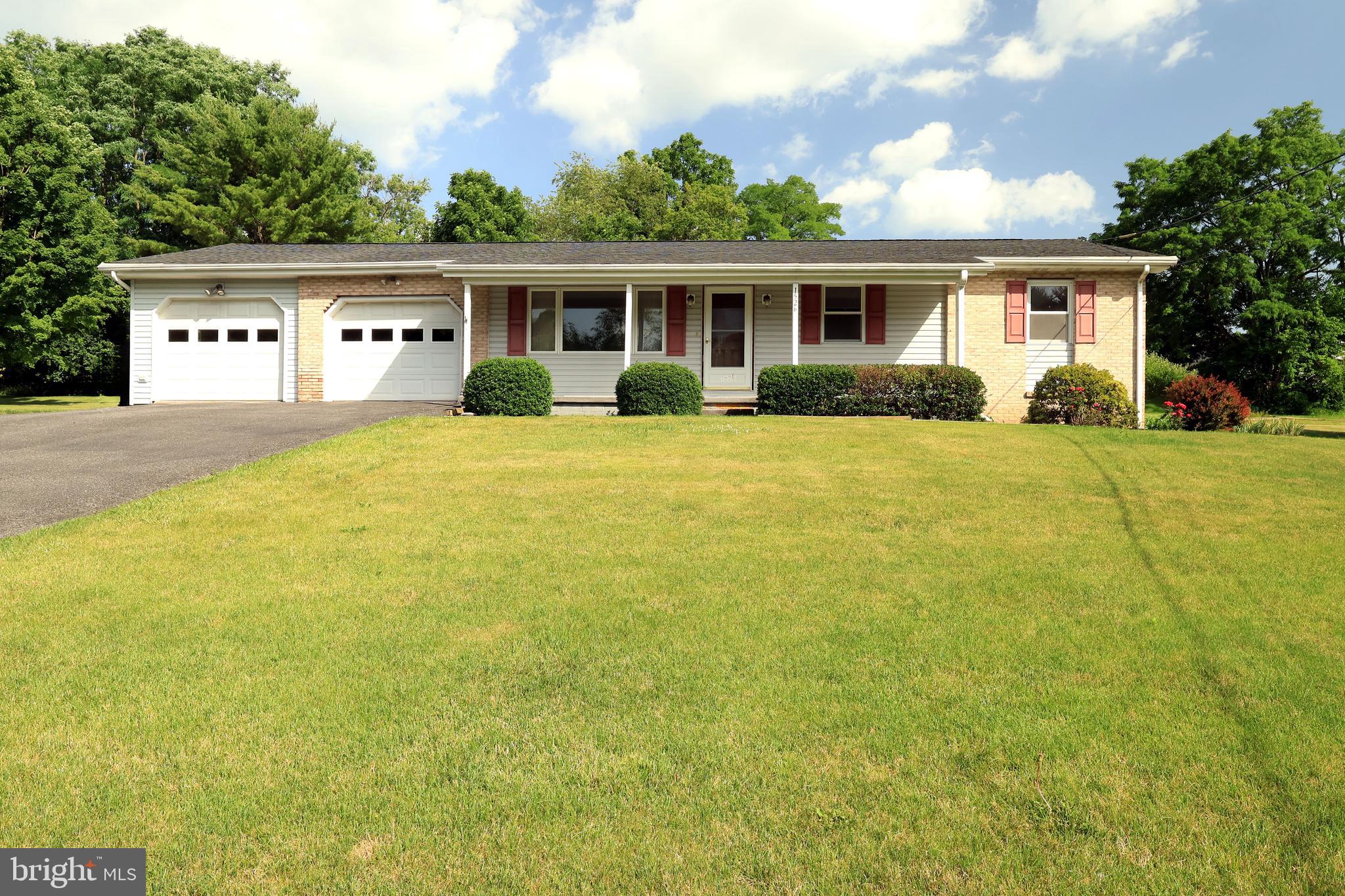 Welcome home to a beautifully designed residence that blends comfort, space, and an ideal location just minutes from Mount Nittany and the Penn State campus. From the moment you step inside, you'll appreciate the inviting layout and the warm, welcoming atmosphere that makes every room feel connected.

The main living spaces flow effortlessly, creating an ideal setting for both everyday living and entertaining,  and featuring original solid oak hardwood floors. With 3 bedrooms, 2 full bathrooms, and 2,312 square feet, this home offers generous room to spread out while maintaining a comfortable, functional design. The finished basement adds valuable flexible space—perfect for a recreation room, home office, fitness area, or media lounge—adapting easily to your lifestyle.

One of the home's standout features is the bright and inviting sun room, where natural light pours in throughout the day. Whether you're enjoying your morning coffee, reading a favorite book, or simply relaxing while overlooking the outdoors, this space provides a peaceful retreat in every season. Also included are efficient mini-split units with heat and A/C, to keep you comfortable year round.

Outside, the two-car garage offers convenience, ample storage, and protection from the elements, complementing the home's practical design.

Situated in a sought-after location near Mount Nittany and Penn State's campus, you'll enjoy easy access to outdoor recreation, healthcare, dining, shopping, and community events while still coming home to a quiet residential setting.

Thoughtfully designed living spaces, a versatile finished basement, an inviting sun room, and a location that keeps you close to everything make this home an exceptional opportunity for those seeking comfort, convenience, and lasting appeal.