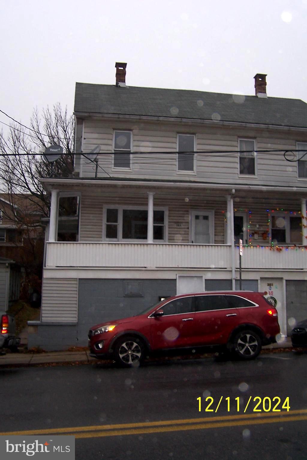 Check out this recently renovated 3 bedroom house with 2 additional finished unheated rooms on 3rd level. Replacement windows throughout, all new laminate floors, new w/w carpet, painted and paneled walls. Modern kitchen and new bath vanity, mirror & toilet.  EFM oil burner and 100 AMP service.  Front & side porches and a small fenced yard completes the home. Move in ready, motivated seller, make an offer.