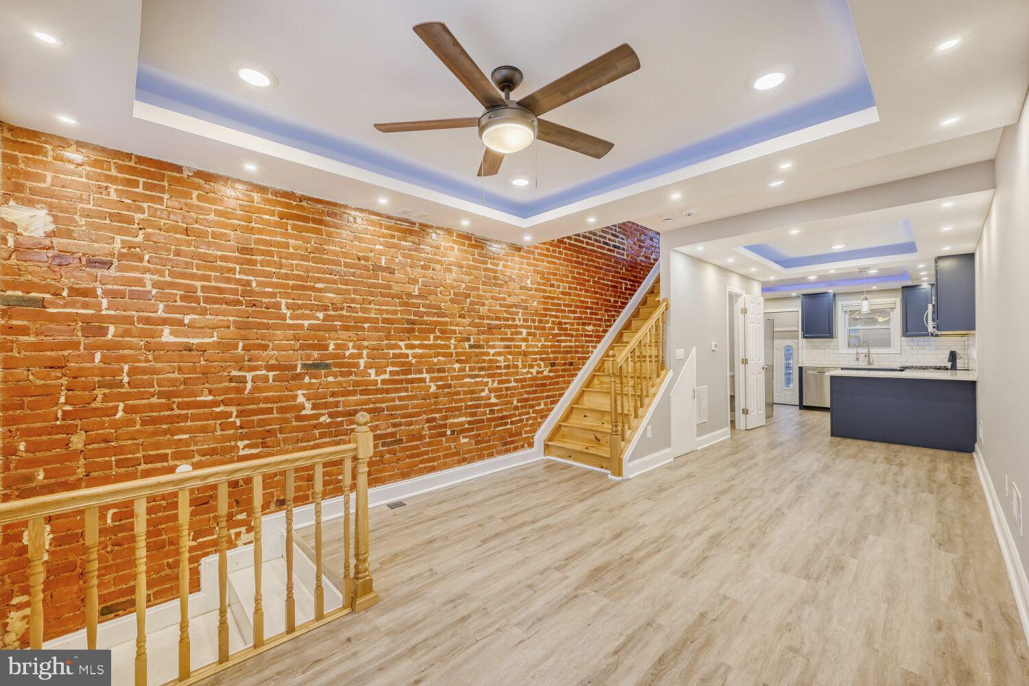 GREAT DEAL - MOTIVATED SELLER. PRICE REDUCTION & SELLER OFFERING $7,500.00 TOWARDS BUYER'S CLOSING COSTS. Seller rented bedrooms at $1,100 per room. Each bedroom and basement have their own separate entrance and full bathroom. Great price and concession for turn key asset.

 Welcome to 703 N Port Street, a beautifully renovated contemporary row home offering stylish city living just minutes from Johns Hopkins Hospital. This 3-bedroom, 3 and ½ bath home blends modern design, thoughtful functionality, and quality finishes in one of Baltimore’s great neighborhoods. The open concept main level features LVP, exposed brick walls, upgraded lighting, and a bright living and dining area that flows seamlessly into the gourmet kitchen—perfect for everyday living and entertaining. The kitchen is outfitted with quartz countertops, sleek royal blue cabinetry, and stainless-steel appliances. Upstairs, two spacious bedrooms each offer private en-suite baths. The lower level provides ample entertainment space with its own 3rd bedroom and en-suite. Step outside to enjoy a private rear patio and the rare convenience of off-street parking with a dedicated parking pad. This home even has the potential to purchase the side lot from Baltimore. A few blocks north of Patterson Park and minutes from JHH, and popular neighborhood cafés and shops, this move-in-ready home delivers modern comfort, convenience, and excellent proximity to major city amenities. Come take a look.