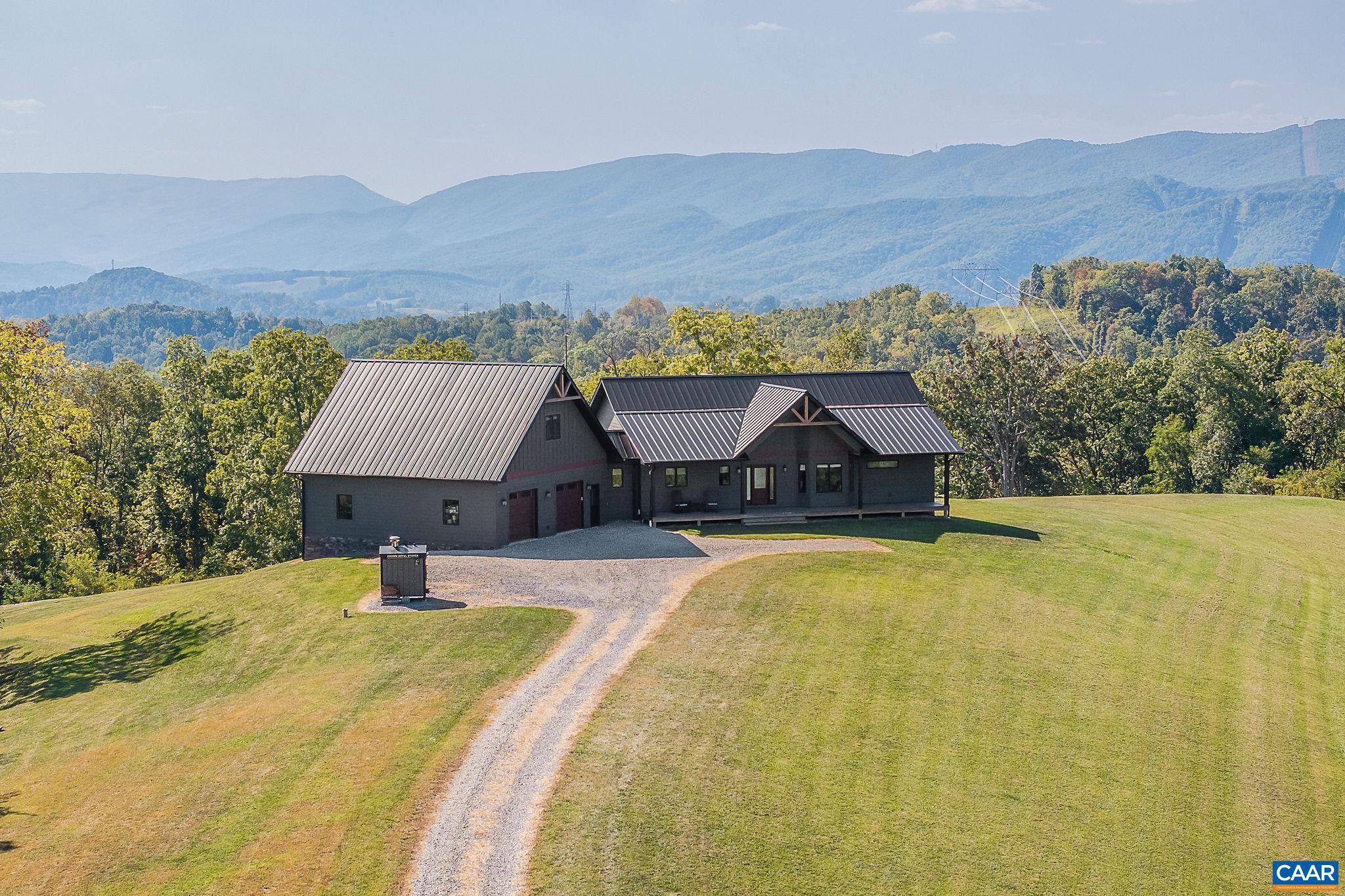 Welcome to Serenity Ridge, a 365-acre property in Pembroke, Virginia that offers privacy, recreation, and direct access to Jefferson National Forest. The land features rolling open fields, mature woodlands, a mountain stream, and an internal trail system. A cabin on a high ridge provides long views, while the acreage supports hiking, hunting, farming, and more. The main residence is a custom-built five-bedroom, three-bath home completed in 2021. The chef?s kitchen includes premium appliances and a custom pantry, while the primary suite offers a walkthrough shower and dual closets. Additional spaces include a home office, mudroom, and oversized two-car garage with room for recreational vehicles and gear. Expansive windows frame mountain views, and an alternative wood boiler heating system provides efficiency. A large deck with saltwater hot tub enhances outdoor living. Located 25 minutes from Blacksburg and one hour from Roanoke Airport, the property is convenient to both town and travel. Nearby destinations include the New River, Cascade Falls, and multiple Appalachian Trailheads.