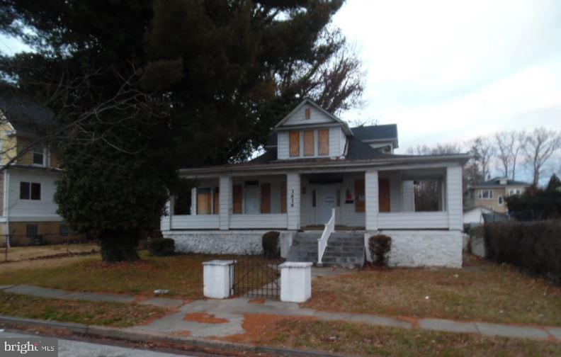 Opportunity awaits in this three bedroom two bath. Property has been damaged by fire and is boarded with no access. Work is required to make this home move in ready but could be worth the effort.  Take a drive by and see if this may be your next investment.