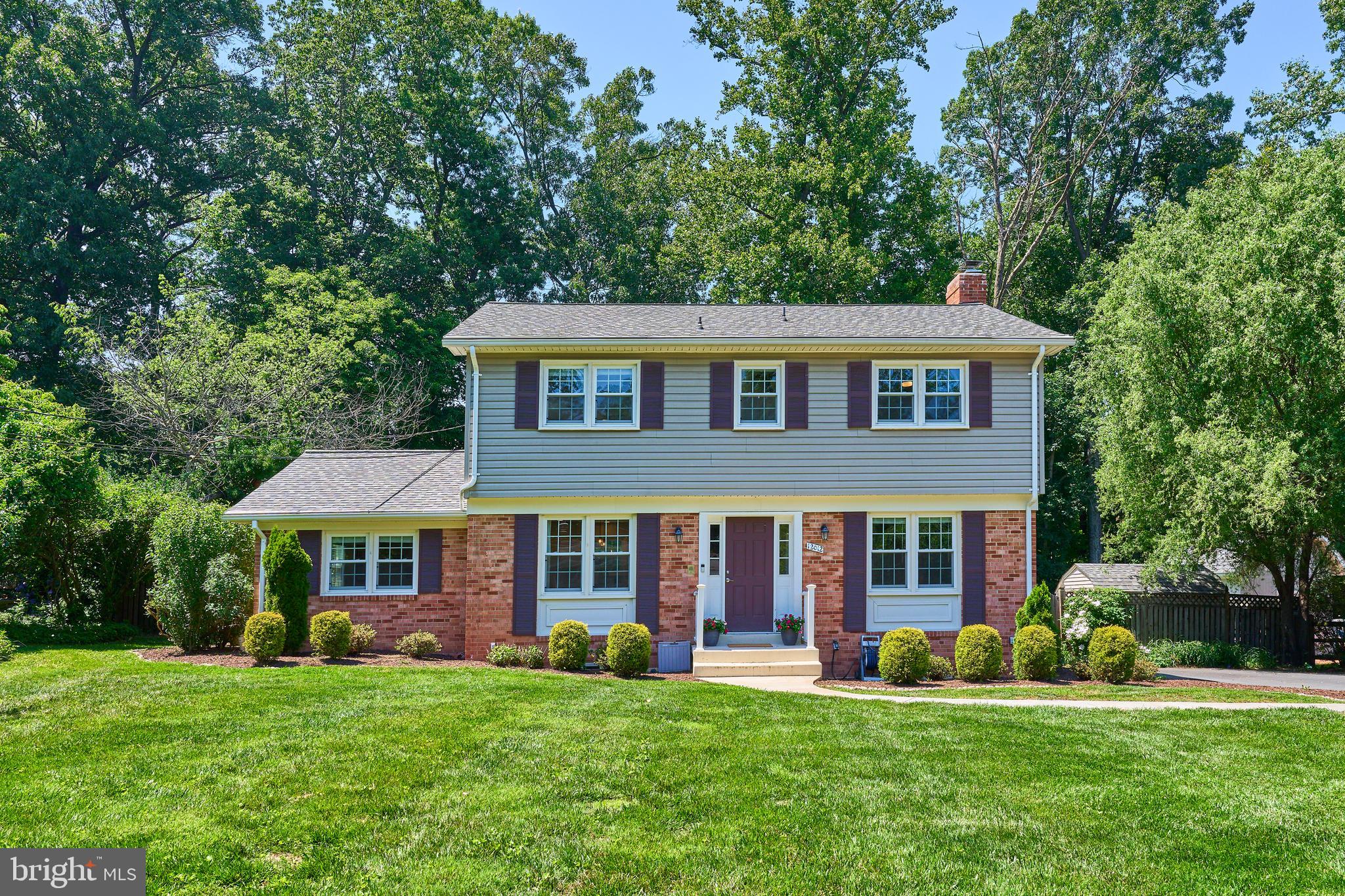 Nestled in the charming community of ValeWood Manor in the Oakton school pyramid, this delightful fully updated, Colonial home offers a perfect blend of classic elegance and modern comfort. Built in 1969, this well-maintained residence boasts a timeless brick and vinyl siding exterior, inviting you to explore the warmth within. Step inside to discover a spacious layout featuring three inviting bedrooms and two and a half bathrooms, ideal for both relaxation and entertaining. The heart of the home is the cozy living area, complete with a charming fireplace that beckons for cozy evenings spent with loved ones. The stunning kitchen with beautiful cabinetry and gorgeous quartz countertops is any chef's delight. The fully finished basement, with walkout access, provides endless possibilities—whether it’s a game room, home office, or a serene retreat. Set on a generous 0.53-acre lot, the outdoor space offers ample room for gardening, play, or simply enjoying the fresh air. The expansive, fenced-in backyard extends beyond the first tree line, making it perfect for little ones and pets to explore safely. . The driveway provides convenient parking, ensuring that you and your guests feel right at home. The electrical panel has been completely updated to increase amperage giving you the peace of mind.  Some other key updates include a new septic system(2023), chimney(2023), HVAC(2021). ValeWood Manor is a community that embraces tranquility while being just a stone's throw away from local amenities. There is a well maintained trail that originates on the street and is great for short hikes and daily walks in nature. The Oakton swim and Racquet Club is in very close proximity. This residence is not just a house; it’s a place where memories are made and cherished. Experience the comfort and charm of this lovely home—your sanctuary awaits!