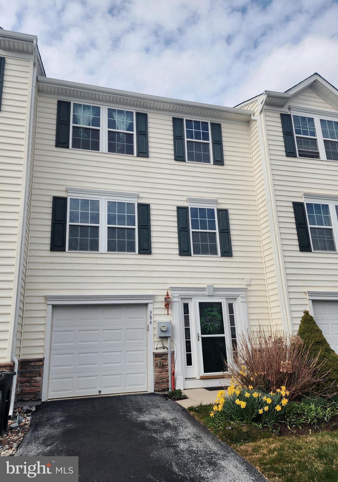 Welcome to this charming 3 bedroom home in a well desired neighborhood at Round Hill Development.  Minutes from newly developed restaurants and shopping.   Entrance floor has a powder room and large finished multi use room with walk out  patio.   Main  floor has a nice size living room with a lot of natural light.  Beautiful  French Doors going out to a great large secluded trex deck. The kitchen has island, gas stove and an added bump out off the kitchen.  The 3rd floor has 3 spacious bedrooms  and a hall bathroom. The Primary bedroom has a large walk in closet with an attached bathroom with a double sink.  All rooms come with ceiling fans.  This home comes  with convenience, comfort and carefree living.  Don't miss out on this beautiful opportunity, as it will not last long.