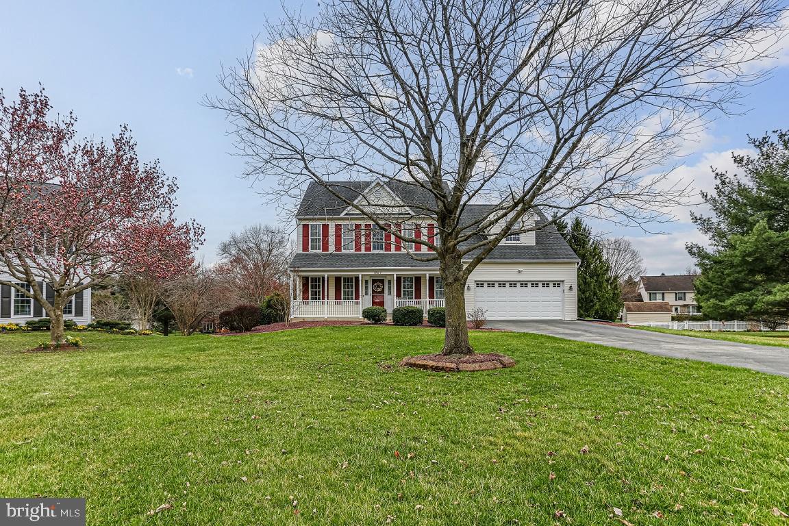 Welcome home to this fully updated four bedroom two and one-half bath colonial in the sought after Harvest Farms subdivision. Featuring 3400 finished square feet on a half acre lot, and situated on a quiet cul-de-sac, this home is move-in ready. The main level features an updated open eat-in kitchen with newer cabinets, luxury vinyl plank flooring, granite counters with a center island, stainless steel appliances, and a bay window. The kitchen opens directly to the spacious family room with a natural gas fireplace, and french doors leading to an 18x14 foot covered screened deck overlooking your private level back yard. The main level is further complemented by separate formal living and dining rooms also with luxury vinyl plank flooring, a half bath, and a laundry/mud room off of the garage entrance. The walkout lower level has a recroom, office area and a bonus room, as well as plenty of room for storage. From the recroom you walk out to the rear yard and patio. Upstairs you will find four roomy and bright bedrooms, including the primary bedroom with a vaulted ceiling, sitting room, his and hers walk-in closets, and a fully updated attached master bathroom with a roman shower, separate soaking tub, and dual sinks. Located in the Carrolltowne Elementary/Liberty High School district, this home is ready and waiting for you!
