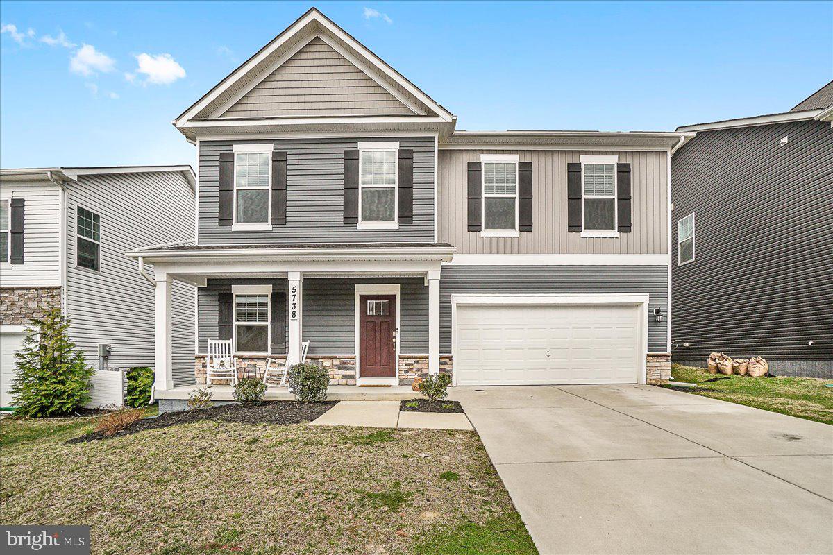 This home is located in the Oakdale School District, in the community of The Preserve at Long Branch. This 4 years young home offers style and functionality, with a main level guest room and full bath. The second level offers durable luxury vinyl plank floors, upgraded lighting and an open concept layout. 

The gourmet kitchen features stainless steel appliances, upgraded counter tops with a timeless subway tile backsplash, and a spacious island for meal prep and entertaining. This level also includes a family room that has a slider walking out to the patio and enclosed/fenced backyard. 

Upstairs there are three bedrooms and an additional two full bathrooms. The primary suite boasts a sizable walk-in closet and full bathroom with dual sinks and standing shower. A convenient laundry room completes the top floor. Garage with durable epoxy flooring. This home is a short distance from various shops and restaurants, including Downtown Frederick and all that it has to offer.