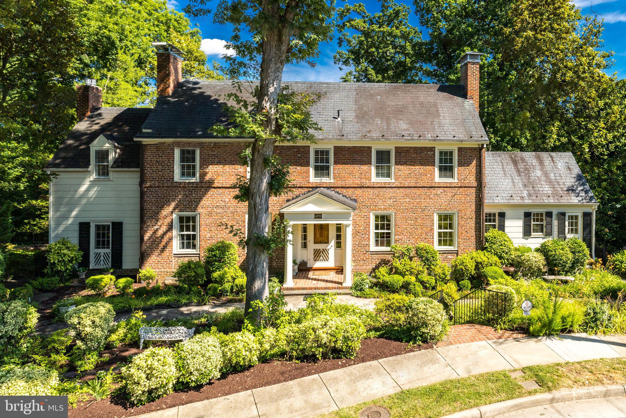 This beautiful and dramatic Belle Haven home offers wonderful entertaining spaces as well as comfortable family everyday living.  Sited amongst towering mature trees, 6237 Radcliff Road, invites you in through a handsome front entrance into a very spacious foyer.  Immediately you realize the abundant natural light in this home.  The formal living and dining rooms are gracious, offering nine-foot ceilings, detailed moldings, pegged hardwood floors and handsome fireplaces in each room.  The paneled family room offers a wall of windows, a gas fireplace and built-in bookshelves.   The updated kitchen with fifteen-foot vaulted ceilings and a dramatic fan window would inspire anyone to become a gourmet cook!  It’s well-appointed with an island and a breakfast bar, soft close cabinetry, high-end appliances, a wine cooler and Perrin & Rowe/Mayfair faucet.  An exciting Gallery with floor to ceiling glass windows overlooks the gorgeous mature trees including a blooming magnolia, has a casual eating area plus a comfortable sitting space for reading or for sharing a glass of wine.  
The graceful curved staircase ascends to the second level where you will find a primary suite with a dressing area, fireplaces, marble bath with oversized shower. A spacious second bedroom with a fireplace and built-in bookshelves offers hardwood floors, crown molding and a glass door opens to the enclosed porch. The third bedroom  has hardwood floors, wood shutters, built-ins, and a large closet.  An updated Jack & Jill bath is convenient for families or guests.  A second story glassed in porch with wood floors overlooks the rear yard.  There is even a peek at the river in the winter time.  
The lower level includes a 4th bedroom, 1.5 baths, office area, an enormous recreation room with built-in bookshelves, a laundry room, additional storage space, and 5th bedroom or exercise room.  There is a perfect blend of sophistication and comfort in this inviting home.  Tax record has incorrect sqft.   Glassed in Galleries - 672 sqft.  Finished lower level - 1,200 sqft not including storage and mechanical rooms.  Total finished sqft. 4,497.   For the first time in twenty years, this is a remarkable opportunity to live in one of Belle Haven’s special residences and become a part of this distinguished neighborhood.