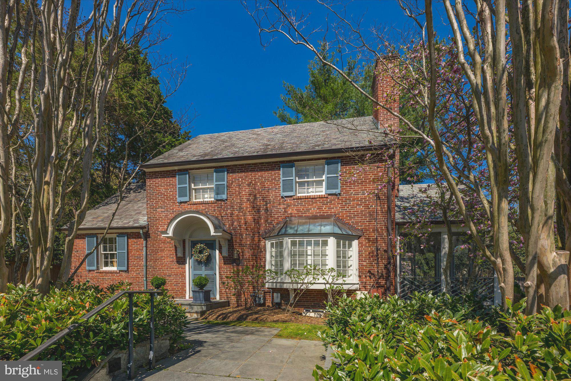 This expanded & renovated Colonial offers a wonderful blend of classic character and comfortable living!
The main level features a welcoming living room with a fireplace, spacious dining room w/built-in cabinetry, private office w/cedar closet, powder room, wet bar, screen porch and a beautifully designed gourmet  kitchen/family room w/casual dining area addition with direct access to the rear flagstone patio and fenced landscaped garden, perfect for entertaining! Upstairs, the second level includes a spacious primary suite with 2 large closets with en suite bath and convenient laundry room, along with two additional roomy bedrooms and a hall bath. The third level provides a private 4th bedroom and full bath, ideal for guests or an au pair suite. The finished lower level offers a recreation room,  full bath, laundry room/storage and direct access to a one-car garage with additional storage/utility room.