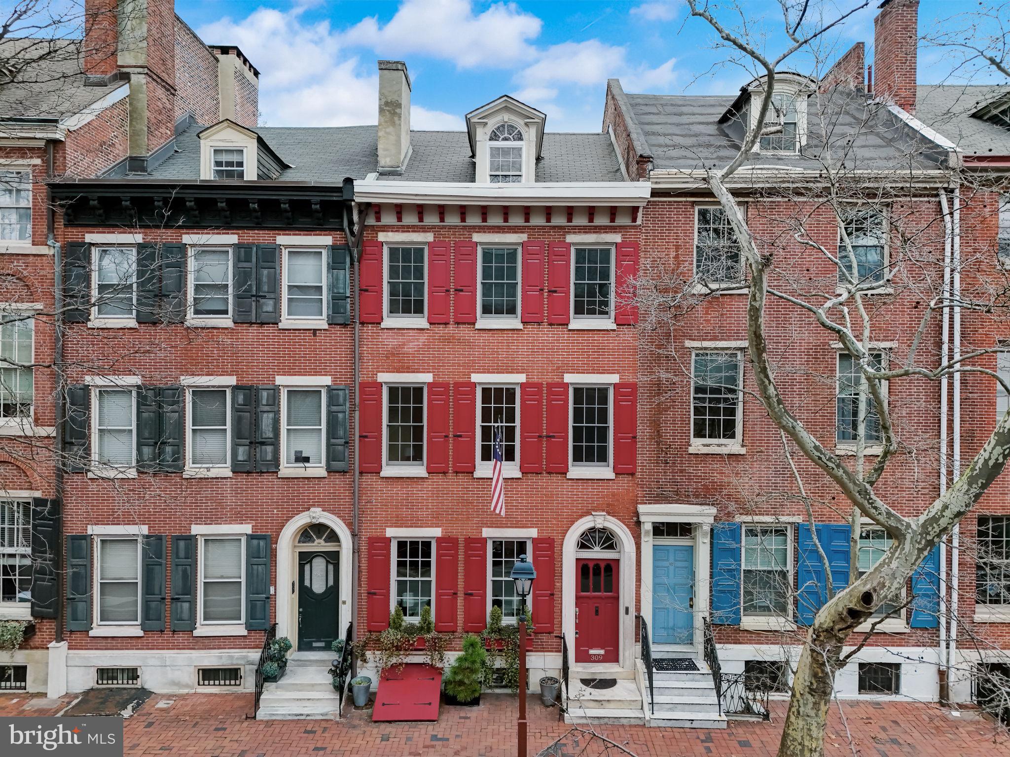 Freshly painted and looking sparkly fresh this historic masterpiece is ready to welcome you home.  Located across the street from the beloved St. Peter's Church this home embodies the architecture and spirit of a true Philadelphia home.  Built @1808 you'll find many details to remind you of that time period, but without forgoing the necessary modern conveniences.  The more formal dining and living rooms feature incredible moldings, and even working gas lamps.  A modern kitchen features a wonderful gathering space to cook and entertain.  Ample cabinetry, lighting in more places than you need, commercial grade appliances, an extra bar sink, a separate dry-bar station, lots of windows to let in the sunshine, in addition to a private patio great for enjoying the outdoors
On the upper levels you will find 6 total bedrooms and 4 full bathrooms.  One of the larger bedrooms was most recently home to the tv/media room.  It features a gas fireplace surrounded with beautiful built-in shelving, and a tray ceiling with inlay LED lighting.  The primary suite was updated more recently with new flooring and built-in shelving. The marble bathroom oasis features  double sinks, double shower sides with multiple shower heads for each, a soothing slipper tub, a separate water closet with a bidet, and cozy heated floors.  There are 2 more ensuites that each feature an incredible, unique bathroom with beautiful marble and porcelain tiles, luxurious showers, and heated floors.  These suites also feature walk-in closets.
The top level features the 6th bedroom which makes a great office space.  There's also a full kitchen with a cooktop, ice maker, dishwasher and a fridge.  This all leads out to your roofdeck oasis created to allow use all year round.  The pergola keeps the sun at bay during the summer months, and the hot tub keeps you toasty in the winter months.  Laundry is located both in the 4th floor laundry room or in the basement where you'll find plenty of storage.  This home has been lovingly maintained, with no expense spared including  Pella historic windows in the front windows installed in 2021, and all of the rear windows have been upgraded to double pane windows with Pella windows in the kitchen.  The home features 3 HVAC zones and a separate radiator heating system.  Parking is super easy with 30 minute parking spots across the street and a parking garage 1 block away that offers monthly parking.   Schedule a private tour today and come marvel at this historic masterpiece!