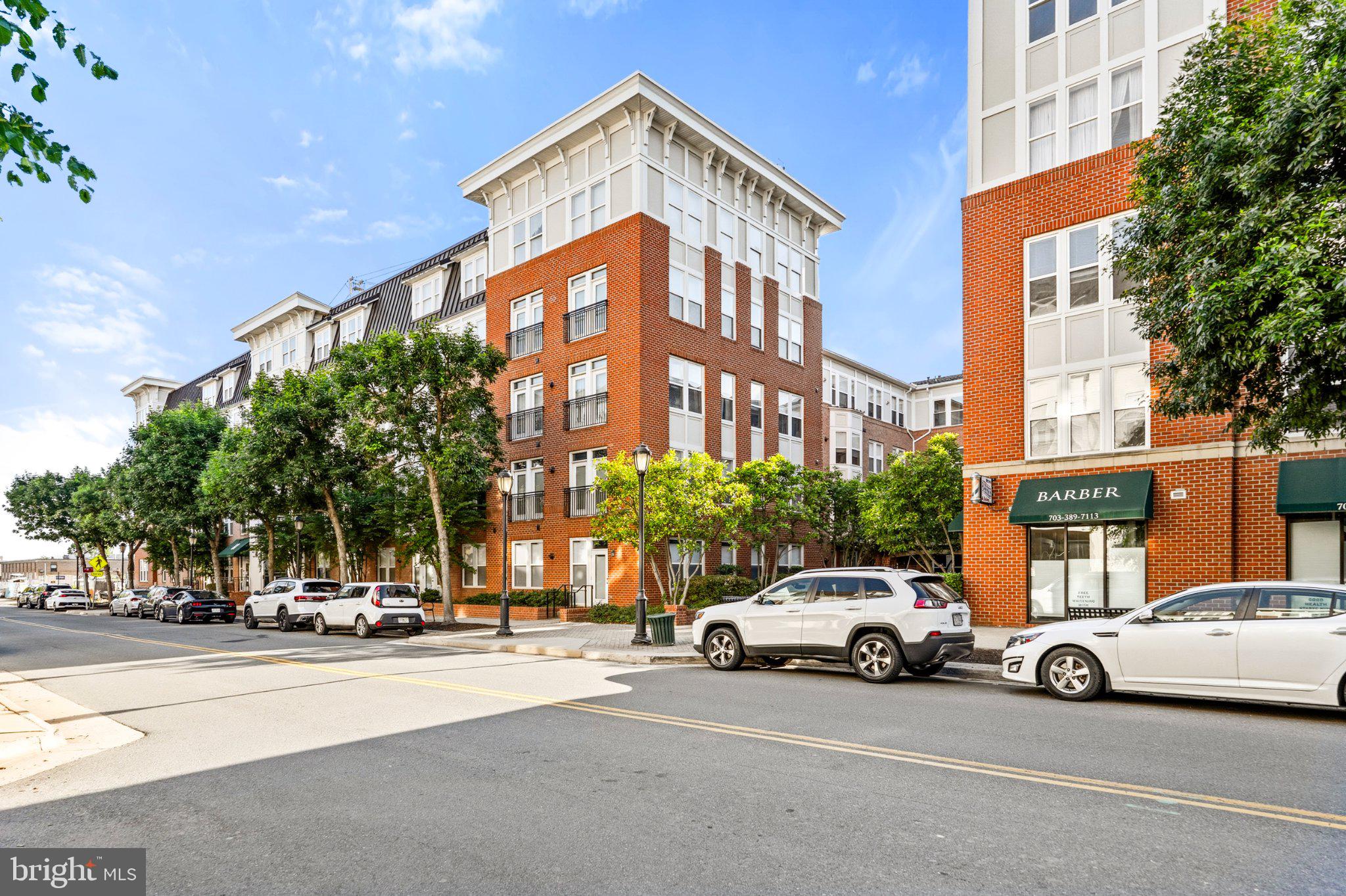 Welcome to The Haven at Halstead, a beautifully updated and move-in ready 1-bedroom, 1-bath condo in the heart of Fairfax. Located just steps from the Dunn Loring–Merrifield Metro (Orange Line), this home offers unmatched convenience with easy access to I-66, I-495, Route 50, and Route 29, making your commute to Tysons, Arlington, or Washington, DC effortless. Inside, the open floor plan is bathed in natural sunlight and features high ceilings, hardwood floors throughout, and a modern kitchen with granite countertops, a breakfast bar, and stainless steel appliances, including a new refrigerator (2025). The living area flows seamlessly to a private balcony, perfect for relaxing or enjoying your morning coffee. The bedroom includes a walk-in closet and ceiling fan for added comfort, an updated HVAC system (2021) ensures year-round climate control. The unit also comes with 1 assigned garage parking space, visitor parking, and a private storage unit. Just moments from the vibrant Mosaic District, you’ll find dining, shopping, and entertainment at your doorstep, including True Food Kitchen, Caboose Brewing Company, Target, and MOM’s Organic Market. Community amenities include a swimming pool, fitness center, indoor basketball court, club room, and secure building access. Experience low-maintenance living with the perfect blend of comfort, style, and connectivity. Schedule your tour today!