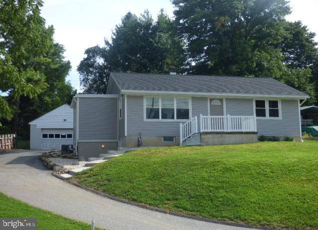 Bring the moving van and move right in to this beautifully renovated 3-4BR, 2BA rancher, with ample off-street parking and NEW detached garage currently in the process of being built. Home is loaded with updated features including 40 yr roof, siding, gutters, downspouts, doors, windows, electrical system, plumbing, kitchen, granite counter, stainless steel appliances, recessed lighting, ceramic tile bath, central vac, gas furnace, duct work, central air, carpeting, flooring, paint and more.  Affordably priced and located within minutes of I83, Rt30 and many East York conveniences.  It doesn't get much nicer! The walk-out lower level is mostly finished with bonus room and adjoining full bath, which could be used as a 4th bedroom. AGENTS, PLEASE read Agent Remarks for important information and see Bright Documents/Seller Disclosure regarding renovations.