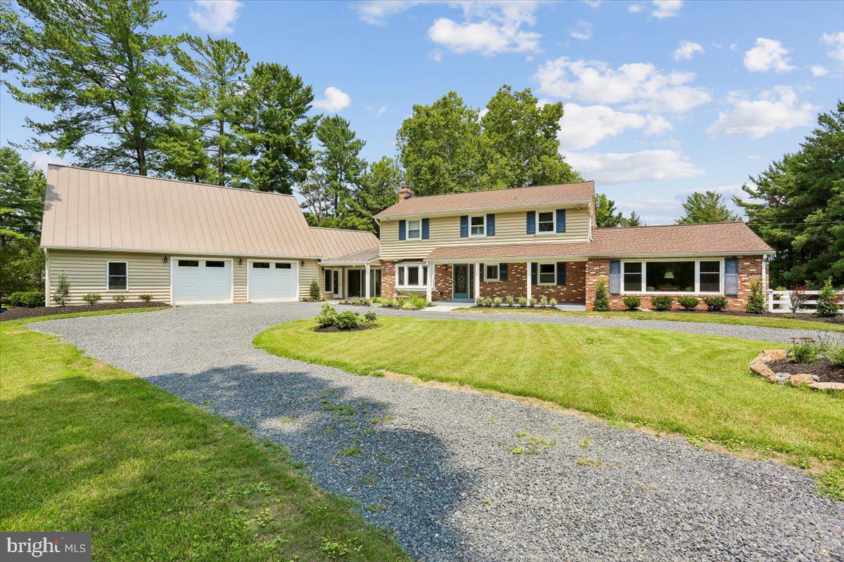 OPEN SUNDAY July 19th 1-4p. 
Private 2-Acre Retreat with Brand-New Kitchen & Show-Stopping Addition!
Welcome home to this spacious 4-bedroom, 4-bath retreat set on 2 private acres in Germantown, just 3 miles to Harris Teeter on Rt 28! This home has been beautifully updated and expanded, offering flexible living space for every lifestyle.
The heart of the home is the brand-new kitchen, featuring pristine white cabinetry, gleaming quartz countertops, a new electric range, and a breakfast bar that opens seamlessly to the dining room — perfect for entertaining. The living room boasts a cozy wood-burning fireplace, while the main-level office with custom bookcases offers the ideal work-from-home setup. A huge family room provides even more space to gather.
A new garage entry room includes a convenient powder room, and a stunning new sunroom with front and rear yard access and windows on both sides brings in natural light from every angle. Both rooms have mini-splits to provide consistent temps all year round.
Upstairs find a king-sized primary suite, with a walk-in closet and updated PRBA w/double sink vanity, tiled shower and private water closet. There are 3 additional bedrooms and a renovated hall full bath.
Step out from the kitchen to the expansive rear deck, overlooking a private, tree-lined backyard — a true outdoor oasis. The thoughtfully designed laundry room includes a utility sink and pantry closets for extra storage.
The lower level has a great space to become a rec room, even has a dog bath! It walks out to a patio and rear yard.
This home also features a brand-new 2-story, 2-car garage addition with a workroom, plus an unfinished upper level ready to become an office, studio, or playroom — the possibilities are endless.