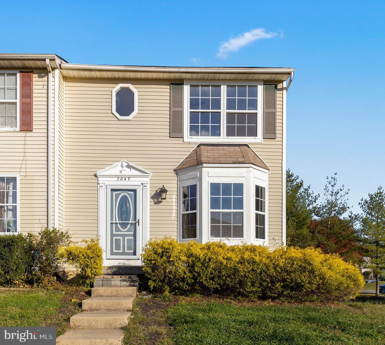 Move right in to this 3 bedroom 2 full and 1 half bath townhome in Parkview Trail!  End unit with bonus side yard, large private fenced rear yard, deck and patio.  Fresh paint & carpeting .  Large spa inspired bathroom with soaking tub, separate shower & dual sink vanity.  3 bedrooms on upper level.  Lowest level used as in law or au pair suite with studio style kitchen/bath/living & bedroom- or turn it into an additional bonus living space!  Main level features open concept living & dining room with bright and open kitchen.  Slider to private rear deck and  yard.  Community features playground, tennis & swimming pool.  Easy commuter access & conveniently located near shopping, dining & entertainment.