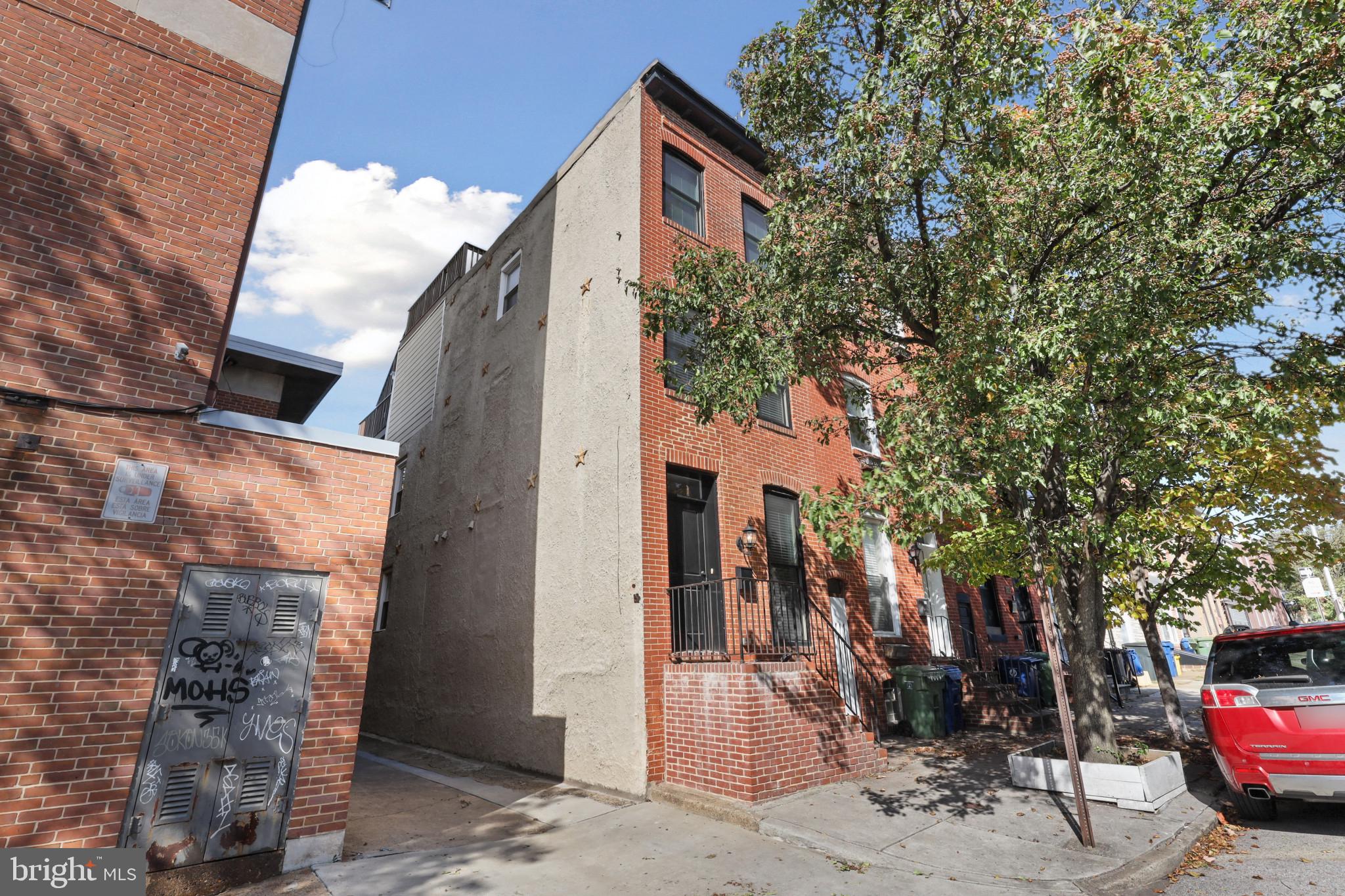 Building Character CHAP Renovation for RENT. 3-Stories PLUS a Finished Lower Level. End-of-Group. PARKING. 2 Roof Decks. The Main Level has a Large Living Room, Dining Room, and Kitchen. The Upper Level includes 2 Bedrooms and 2 Full Baths. The Third Level has a Bedroom, Full Bath, Wet Bar and Direct Access to the Two-Level Roof-Top DECK. Awesome Views of the City Skyline and Marina. The Lower Level Includes 1 Additional Room and Fourth Full Bath. Whole House Audio System. 2-year lease reduces the monthly rent to $3,200.
