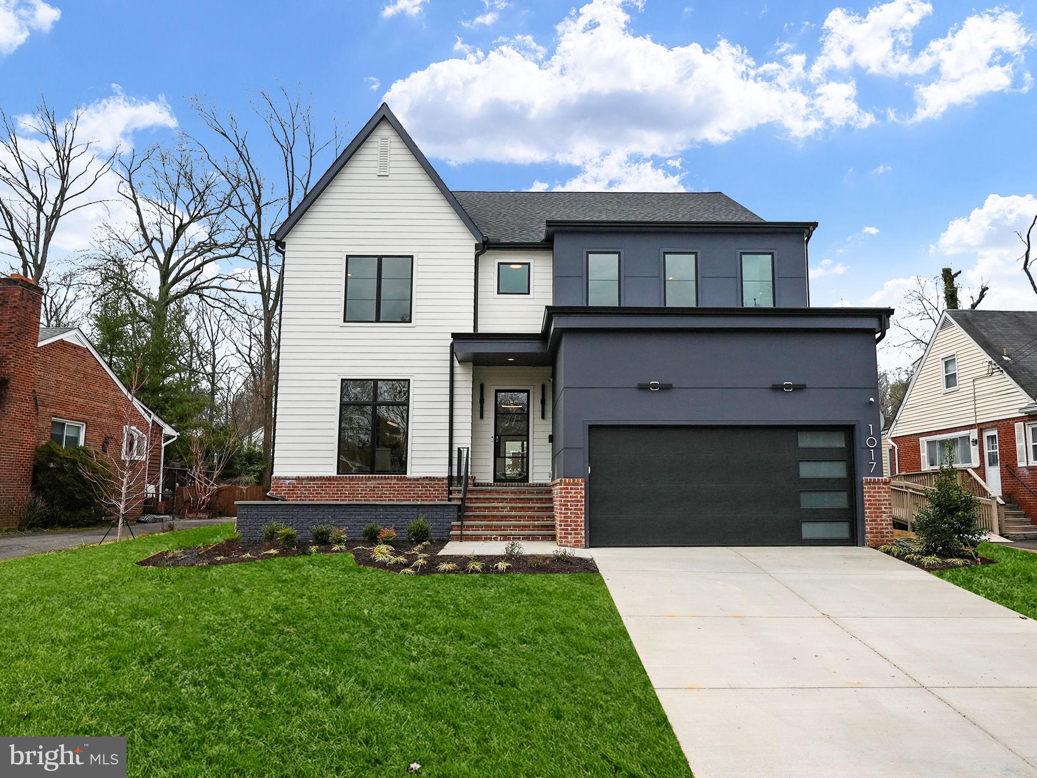 Welcome to this stunning Modern Tudor home built by Georgetown Homes, featuring 6 bedrooms and 6.5 baths. Upon entering, you're welcomed by a sun-filled formal entry, setting the tone for the elegance within. Step onto the exquisite white oak wire-brushed engineered hardwood floors, with 10-foot ceilings on the main floor and 9 feet in the basement and upper level.

The heart of this home is the chef's dream kitchen package, showcasing custom cabinets, an oversized waterfall island, and top-of-the-line Sub Zero/Wolf appliances. Don't miss the custom pantry, conveniently located next to the butler's pantry. The main level also offers a spacious dining room, living room, and a flex room with an ensuite bathroom, suitable as a bedroom or study.

On the upper level, retreat to the luxurious owner’s bedroom, featuring spacious custom his-and-her walk-in closets and an ensuite bathroom with a freestanding soaking tub, custom shower, and heated towel rack. Three additional bedrooms, each with ensuite baths, can also be found on the upper level.

The lower level is perfect for entertaining or accommodating guests, with an au pair suite that includes a full bathroom, a rec room, and additional unfinished space.

Located at 1017 Poplar Dr, this home offers the perfect blend of convenience, comfort, and community, providing residents with an exceptional quality of life. Don't miss the opportunity to make this luxurious property your own! Schedule your tour today.