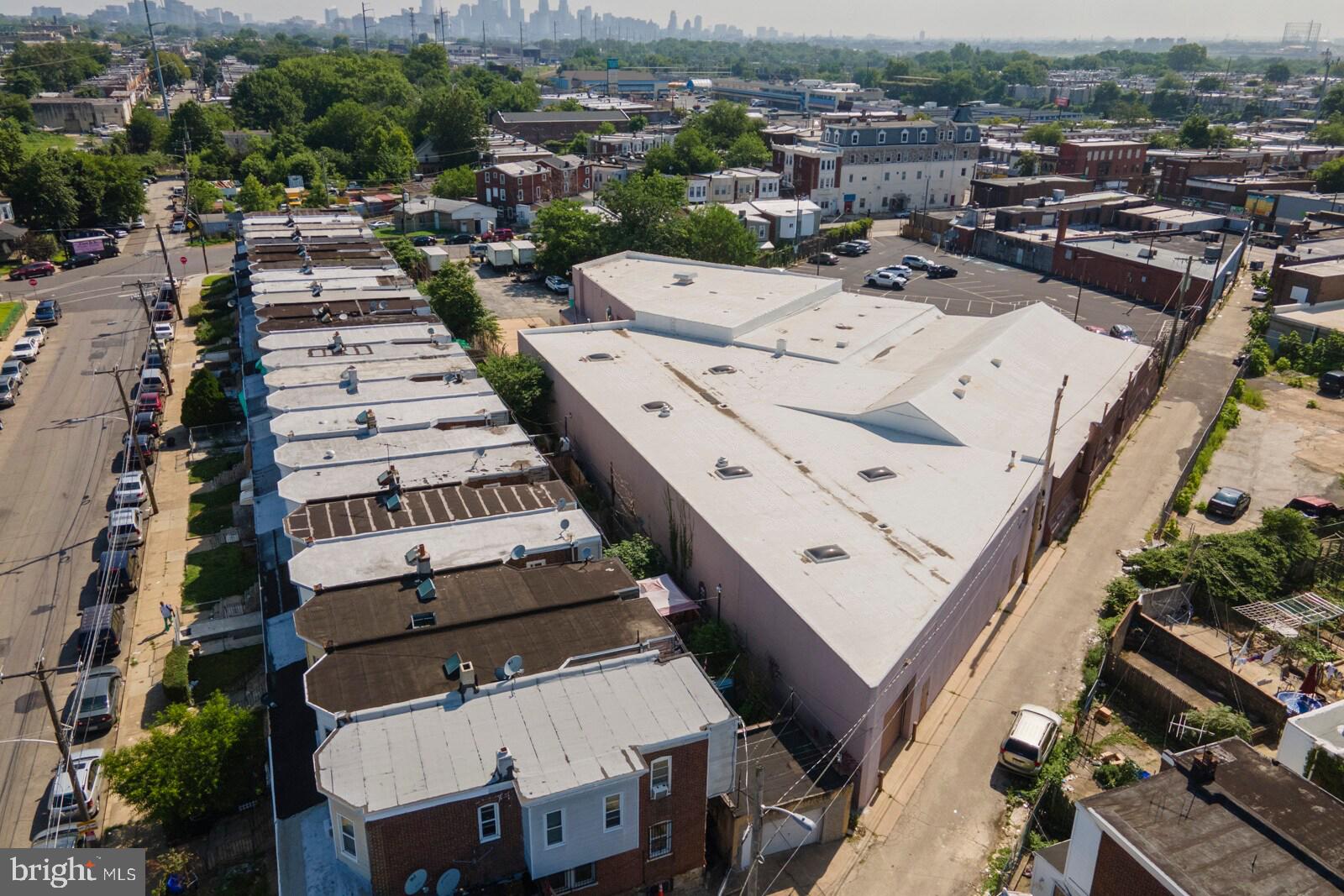 Massive Mixed-Use Industrial Powerhouse in Southwest Philadelphia

Welcome to a rare and incredibly versatile opportunity in the heart of Southwest Philadelphia. This sprawling 72,240-square-foot masonry building offers unparalleled flexibility and scale. With robust construction and highly coveted ICMX zoning, this property is a true blank canvas for investors, developers, and owner-operators looking to capitalize on a massive urban footprint.

The building is intelligently divided into distinct sections, primed to support multiple revenue streams or a massive single-tenant operation. The current configuration features a massive main floor assembly area ready to host large-scale functions, a secondary upstairs event space perfect for concurrent programming or VIP hosting, a professional self-contained office section, and an expansive storage wing fully equipped with two loading docks, two levelers, and three drive-in doors to handle serious logistical needs. The property also includes on-site parking accommodating approximately 10 vehicles.

The Industrial Commercial Mixed-Use (ICMX) designation provides incredible operational versatility. Permitted uses by right are exceptionally broad, covering everything from light manufacturing, distribution, and warehousing to community centers, artist studios, and continued use as an assembly hall or entertainment venue.

To maximize your footprint, this property can be purchased as a package deal alongside 2110 Farrell Ln, an adjacent 9,336-square-foot lot that is also zoned ICMX. This additional parcel presents the perfect solution for expanding your parking capacity, outdoor storage, or future ground-up development.

Bring your vision and execution strategy to a property that offers limitless potential.