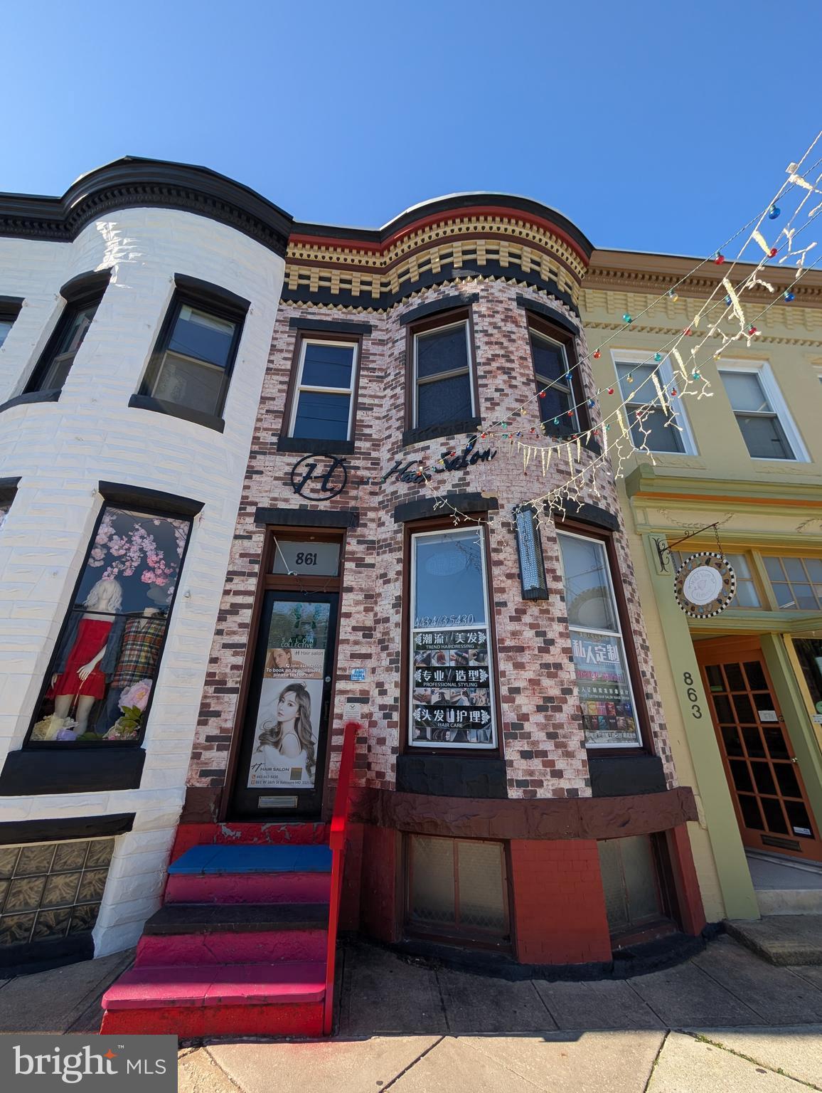 Rarely available commercial and residential opportunity situated directly on Hampden’s iconic "The Avenue" (36th Street)! This high-visibility, high-foot-traffic property offers the ultimate live-work setup or a powerhouse addition to your investment portfolio. Featuring a thriving, top-rated commercial space on the main level and a spacious, private apartment above, the possibilities for high-yield income are endless.

The First Floor: Turnkey, Top-Rated Salon Space.
Currently operating as a highly successful, premier hair salon boasting a stellar 4.9-star Google rating, this main-level commercial space is fully built-out and ready for seamless operation or transition.

Layout & Capacity: Welcoming reception desk and dedicated client waiting area. Equipped with 6 styling chairs and 3 shampoo stations.

Growth Potential: The generous, open floor plan provides immediate space to add additional chairs/stations to easily scale revenue.

Visibility: Massive front windows facing 36th Street guarantee maximum brand exposure and organic foot traffic.

The Upper Level: Spacious Apartment with Private Access
Accessed privately via the rear deck, the second-floor apartment offers incredible versatility as an owner’s quarters, a long-term rental, or a high-demand short-term rental (Airbnb).

Layout: Currently features 4 versatile rooms, 1 full bath, and a full kitchen.

Outdoor Living: The private back deck provides a quiet outdoor retreat right in the heart of the city.

Lower Level & Assets
Basement: Full basement providing excellent extra storage space and convenient laundry facilities.

The Location
Unbeatable placement on 36th Street. Your tenants or clients will be steps away from Hampden’s famous eclectic mix of boutique shopping, celebrated dining, vibrant nightlife, and community festivals. Easy access to I-83 and downtown Baltimore makes this a premier destination location.