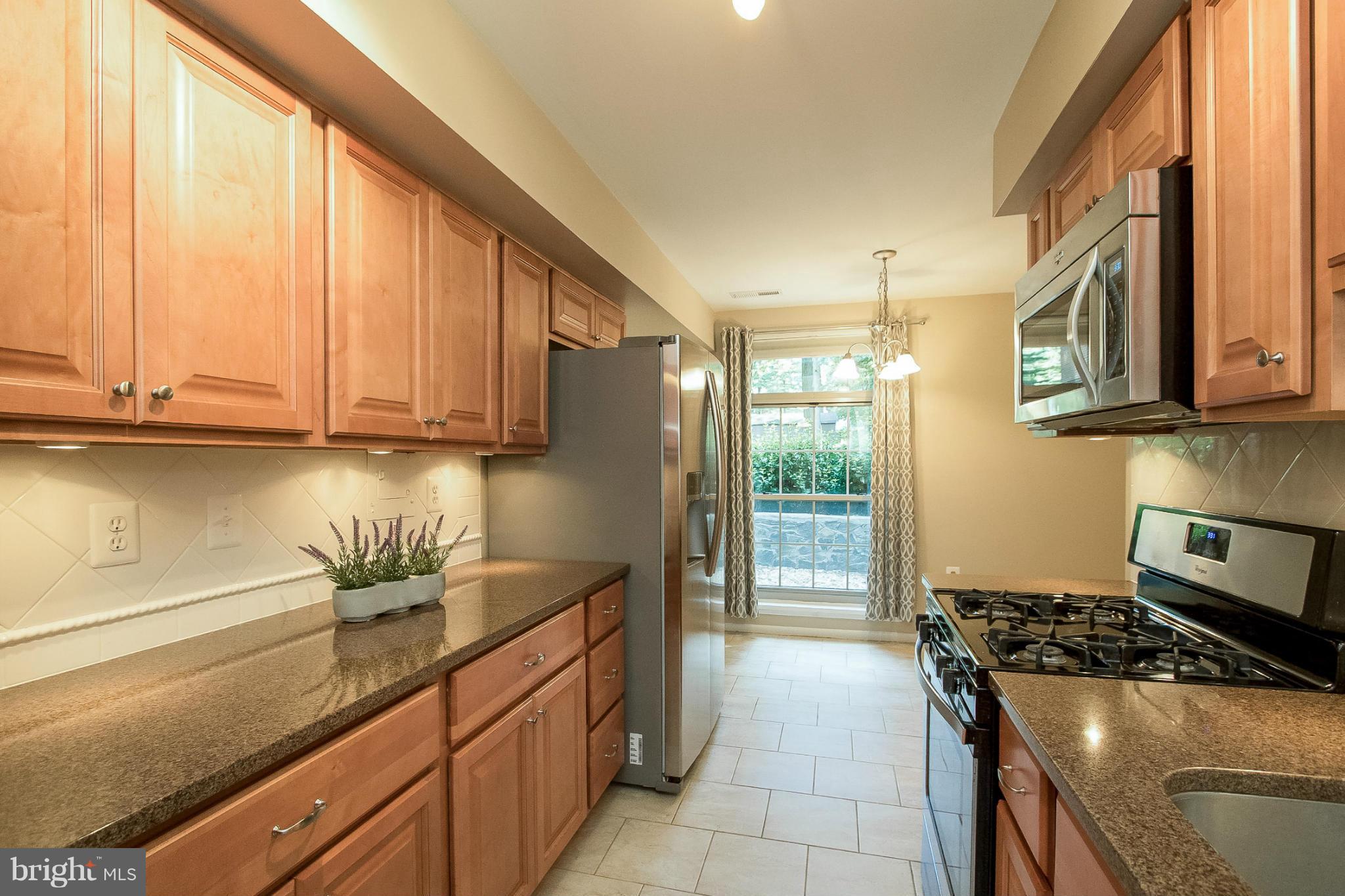Great Deal,Appraised higher than Price.Largest 2 bdrm condo.Condo fee includes all utilities*Fully renovated kitchen/baths*Hardwood floors/upgraded carpet/pad*ceramic tile*fresh paint*Stls stl appl/Quartz counters*New window treatments*Private Patio*Xtra large storage unit/laundry convenient*Pet friendly*Few minutes I495/I66/50/METRO.Near INOVA Fairfax Hospital!