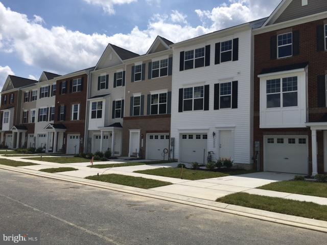 New high performance energy-efficient K.Hovnanian townhome at Admiral's Landing offering 3 finished levels, 1-car garage, brick front. Easy access to 95/895/695. Open floorplan with large kitchen island, open floorplan, gas cooking. Owner's suite with walk-in closet & owner's bath. Finished rec room with powder room.