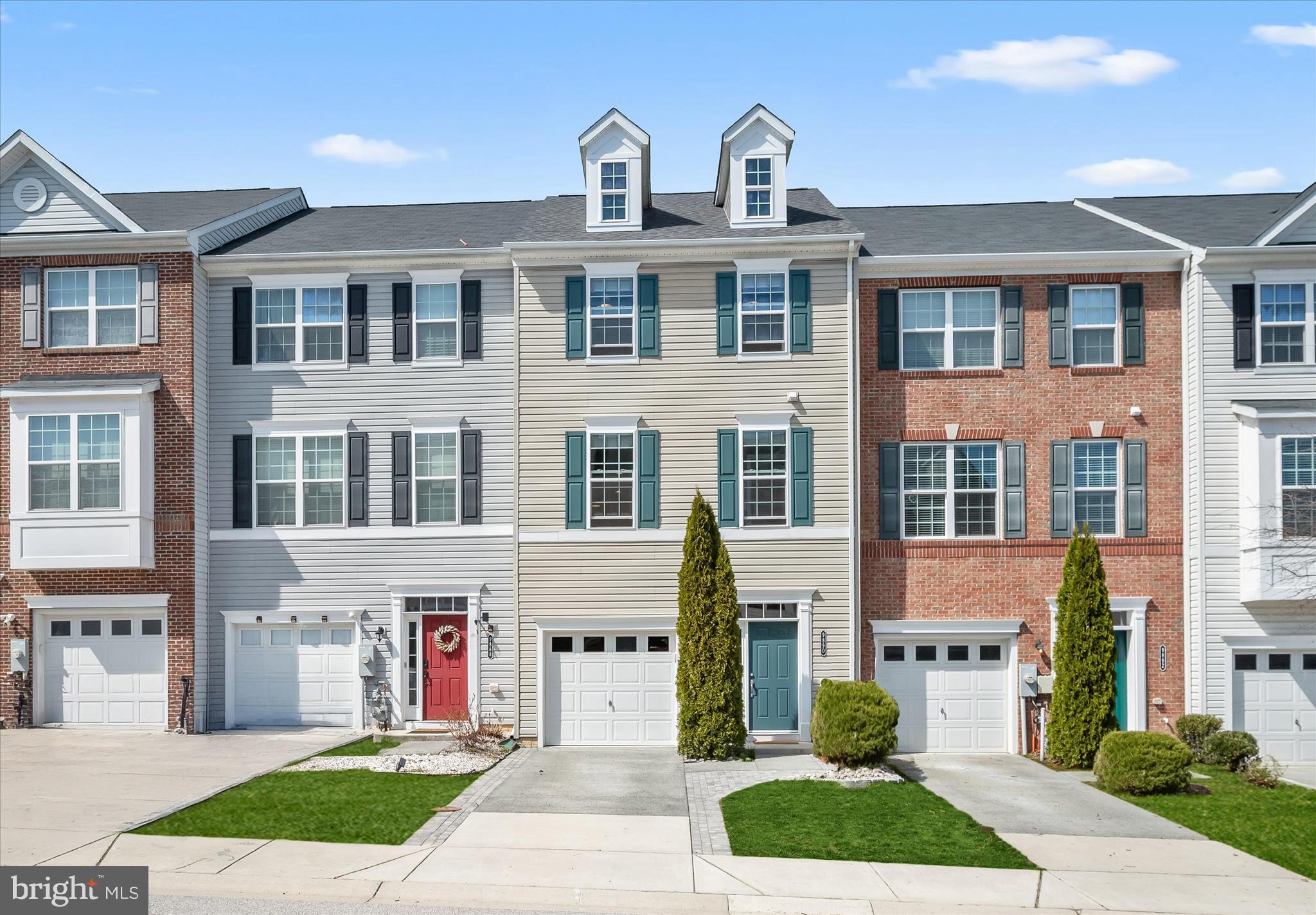 **OFFER DEADLINE - Tuesday 3/31 at 4:00 pm** Tucked within the High Ridge Meadows community in Howard County, this beautiful three-level garage townhome offers a peaceful setting backing to a wooded view. Outdoor living is thoughtfully designed, with a large composite deck off the main level and kitchen, as well as a walkout lower level leading to a beautiful brick paver patio, perfect for relaxing or entertaining.
Meticulously maintained by its original owners, the home showcases upgrades throughout and a spacious open floor plan. The main level features crown molding and upgraded laminate plank flooring, seamlessly connecting the kitchen, dining, and living areas. The kitchen stands out with bright white upgraded cabinetry, undermount lighting, granite countertops, a design-inspired tile backsplash, center island, and pantry. Just off the kitchen, the dining area opens to the deck through a sliding glass door, while the adjacent living room provides generous space for everyday living. A powder room completes this level.
Upstairs, three bedrooms include a comfortable primary suite with a walk-in closet and an en-suite bath featuring a double sink vanity, updated mirrors, lighting, and a glass shower door. Two additional bedrooms share a hall bath, and the conveniently located laundry room adds everyday ease.
The entry level offers direct garage access, a versatile family room with a sliding glass door to the patio, and an additional powder room. Outside, the paver patio backs to trees, creating a private, natural backdrop. The roof has been replaced within the last year and includes a transferable warranty for added peace of mind.
Nearby High Ridge Park and North Laurel Community Center offer outdoor recreation and fitness amenities, while quick access to major commuter routes including US-29, I-95, and Route 1 makes travel to Baltimore, Washington, D.C., and surrounding areas simple.