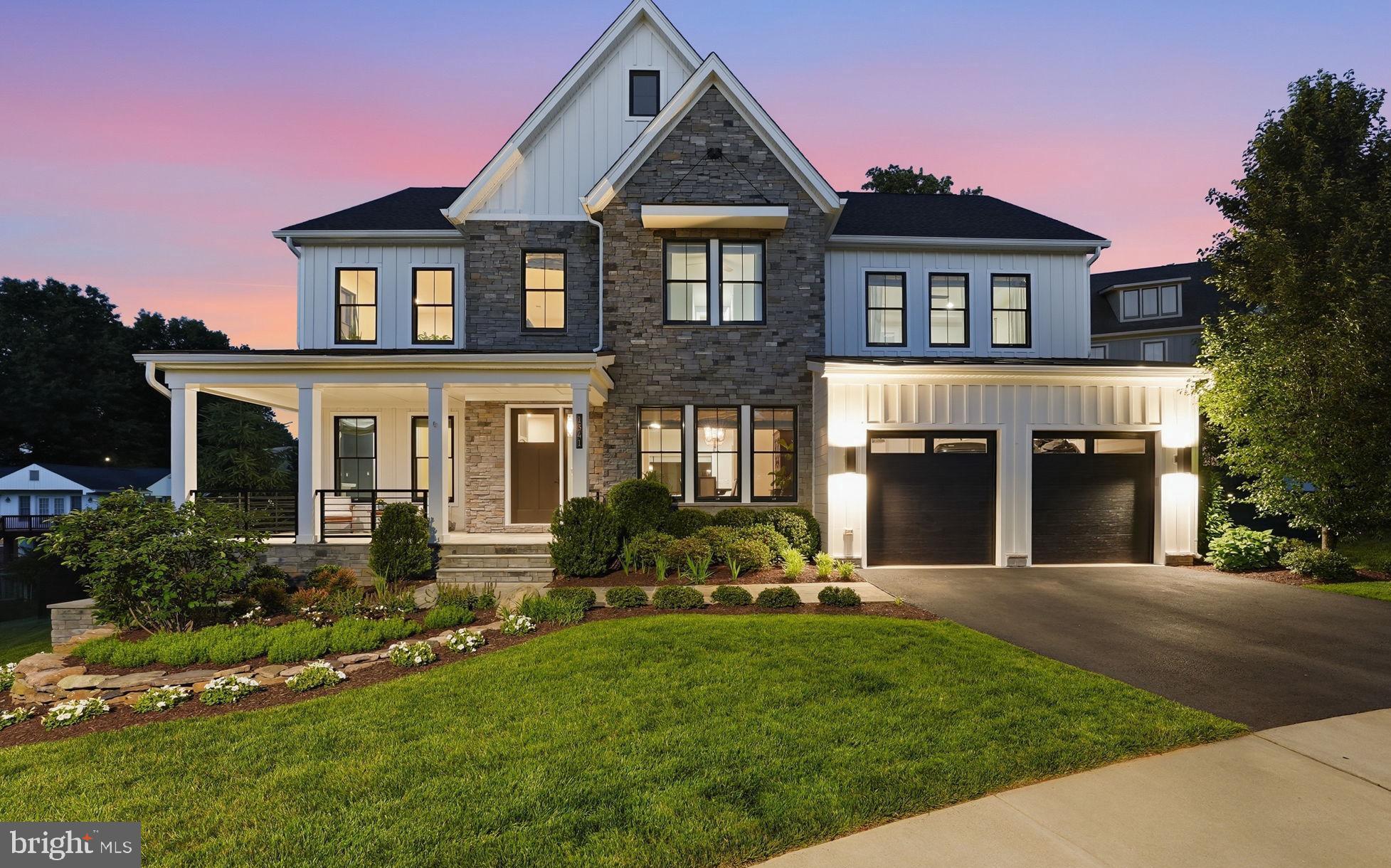 Introducing 1341 Monitor Lane, a beautifully appointed modern farmhouse in The Retreat at McLean, offering 5 bedrooms, 5 full baths, 1 half bath, and a thoughtful balance of refined finishes, flexible spaces, and indoor-outdoor living.

The main level is centered around a wide-open floor plan with a spacious family room, gas fireplace, and a dramatic wall of sliding glass doors that fully pockets away, creating a seamless connection to the covered outdoor living area. The deck features a fireplace and TV area, extending the main living space outdoors and leading down to the hardscaped patio and yard. On the opposite side of the main level, a private office with double doors and a real wood-burning fireplace provides a warm and quiet space to work.

The kitchen features a massive center island, Wolf range, Sub-Zero appliances, abundant cabinetry, and excellent flow into the living and dining spaces. A bonus room off the kitchen, currently used as a children’s playroom, adds valuable versatility and could serve as a second pantry, homework area, prep space, or household command center.

Upstairs, all four bedrooms include en suite full baths. The primary suite features custom millwork, separate vanities, and a generous walk-in closet with built-in organization. The laundry room is thoughtfully designed with direct access to both the primary closet and the main hallway serving the secondary bedrooms. At the top of the stairs, a large loft space creates a true secondary living area, with the flexibility to remain open or be enclosed as another office, library, or den.

The finished lower level adds two generous living and recreation spaces, creating plenty of room for entertaining, relaxing, or gathering with family and friends. Additional highlights include a custom bar with plumbing and beverage refrigerators, a gym room, and a fifth bedroom with an en suite bath. Walk-out stairs provide direct access to the rear yard.

The location of community combines neighborhood privacy with everyday convenience. Less than a mile from J. Gilbert’s, Giant, CVS, and downtown McLean, with the trail to Old Dominion right next to the property, 1341 Monitor Lane offers polished luxury in one of McLean’s most accessible locations.