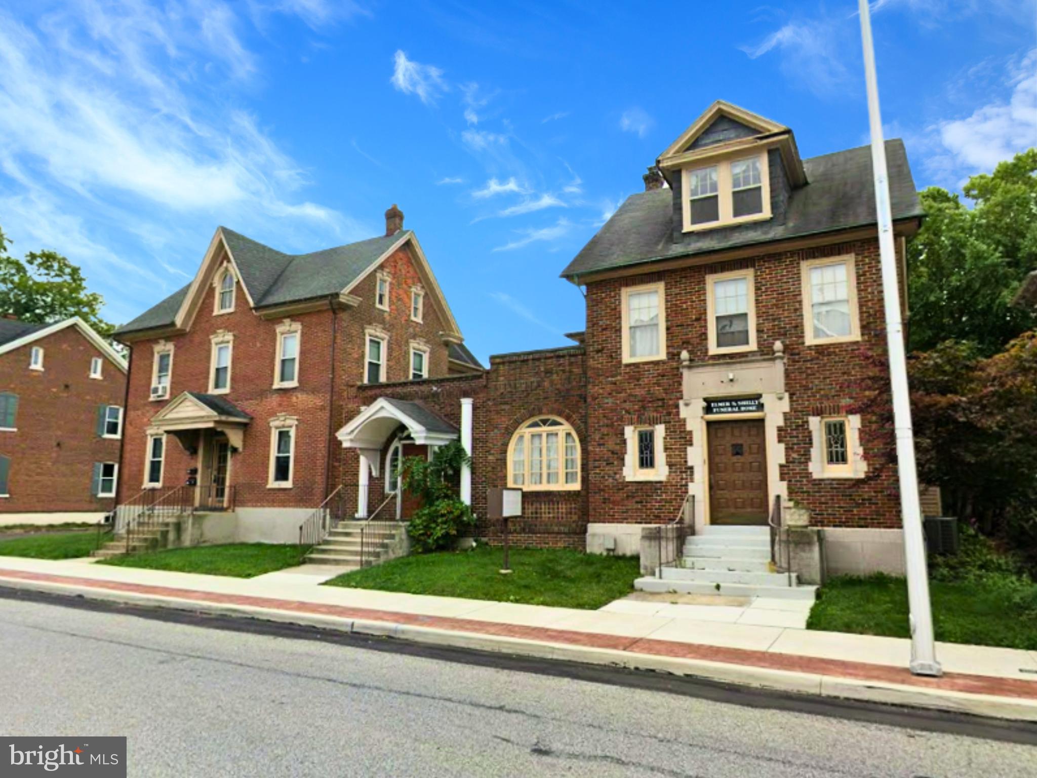 Endless potential awaits with this unique and versatile property offering in the heart of Lansdale Borough. Two connected buildings are being offered together or separately, presenting a rare opportunity for an owner-user, investor, or business looking for flexible space options. Each property has its own tax ID and is connected by a shared entrance foyer, creating a seamless layout while still allowing for independent use if desired.

Most recently operated as a funeral home, the property is located within the Lansdale B Zoning District, opening the door to a wide range of potential uses and redevelopment opportunities. Together, the two buildings offer approximately 7,900 square feet of space with layouts that can accommodate a variety of business or professional needs.

One of the standout features is the exceptional on-site parking, a rarity in town, with approximately 20–23 parking spaces plus a detached five-car garage. 30 E Main also features an adjacent parking lot for added convenience and accessibility. The flexible setup creates an excellent opportunity for owner occupancy while generating additional income by leasing unused space.

Taxes shown include both parcels.