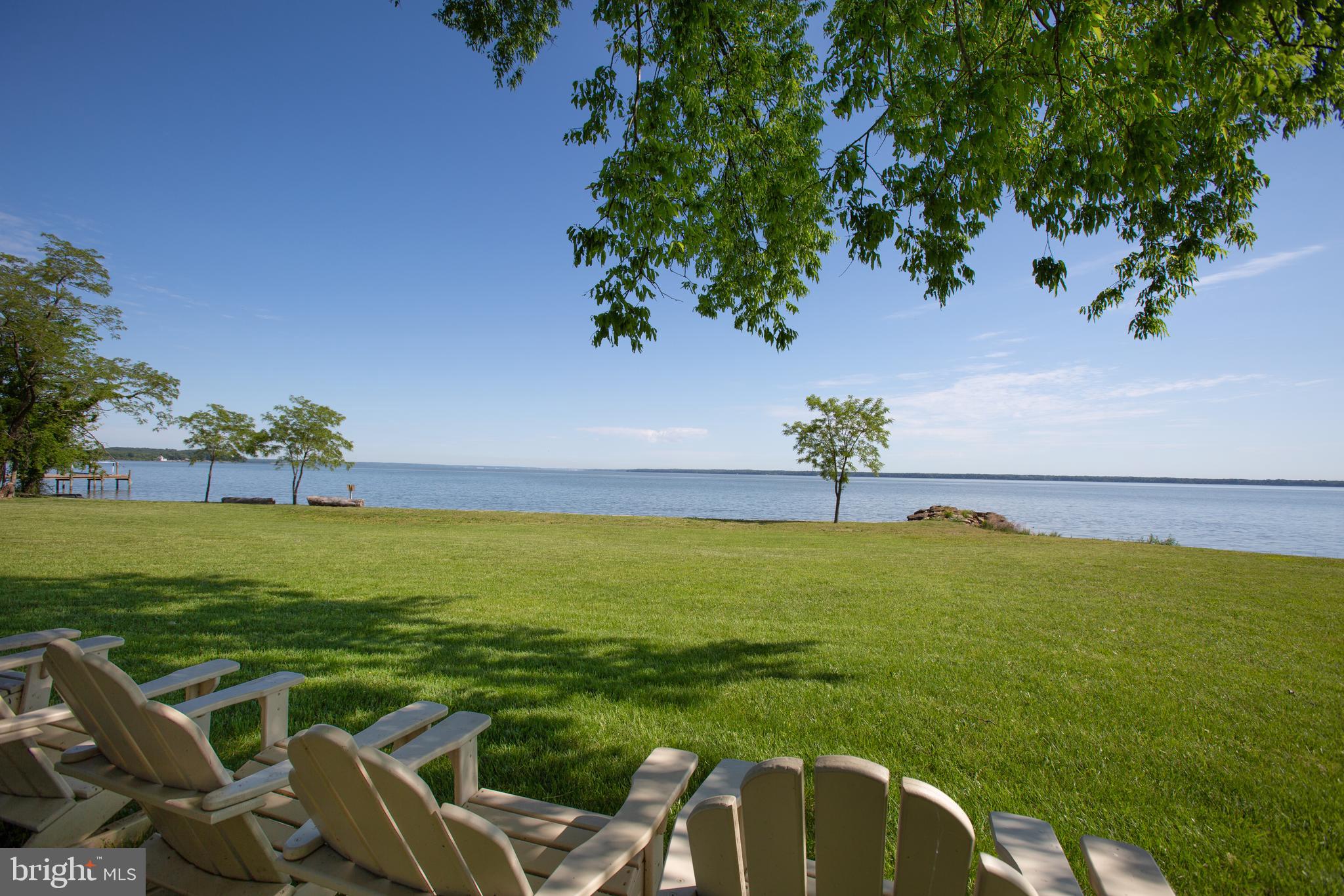 One of a kind gem on a breath-taking panoramic point of the Potomac River. With 5 acres of waterfront property (additional 5 acres of waterfront land adjacent to subject property is for sale as well, both parcels may be purchased together for $1,990,000). Located just 20 minutes from Downtown Fredericksburg on the scenic Belvedere Beach, this land has been perced for 4 bedrooms and ready to support your dream home and sprawling pier. Ripe with history, this land was the home of the Belvedere Hotel and Casino. People from all over, with the likes of Patsy Cline and George Jones, would travel by boat and car to the Hotel and enjoy everything from live bands, gambling, fine whiskey, and beautiful views. Once a central hub for travelers and thrill-seekers, this land has cultivated culture renowned in Virginia since the early 1900s. The current owners have amassed a collection of news articles about the land dating back to 1926.  With 203 feet of prime water frontage and beach, paradise is just a leisurely stroll through your back yard or viewing from the comfort of your newly built dream home. The current owner has installed and maintained rip raps and has meticulously cared for the beach. This land is perfect for the water lover, as it is the ideal spot for shells and shark teeth to wash ashore.  Enjoy the comfort of a quiet community with a front gate and well-maintained and paved roads in an area where the only noise you can be accustomed to is the ebb and flow of the Potomac River. A 200ft pier was permitted and can include two boat lifts. Quick access to Fairview Beach and Hope Springs Marinas, as well as local waterfront bars and restaurants. Your waterfront paradise awaits!