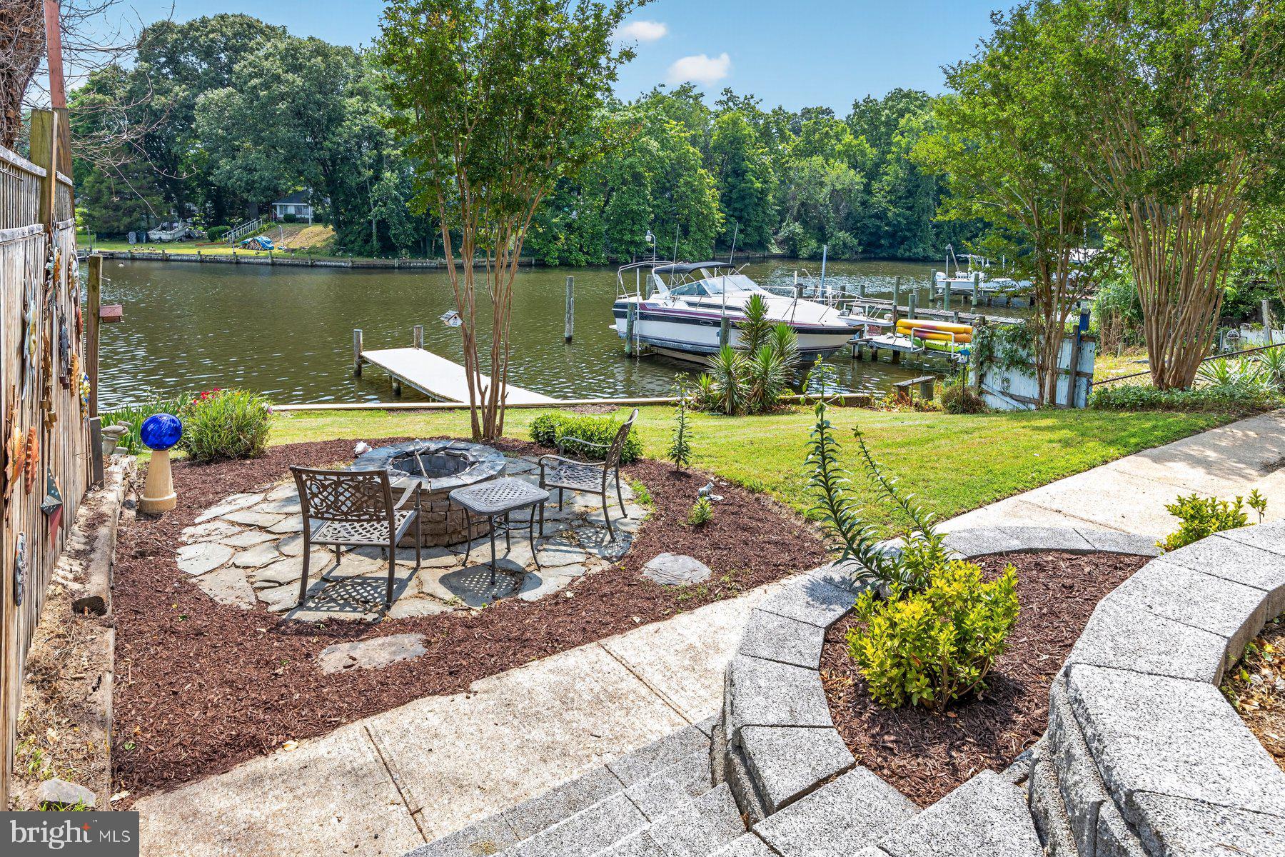 Stunning Waterfront Home with Deep Water Access & Exceptional Outdoor Living
Experience serene, panoramic water views from this beautifully updated waterfront retreat offering 5 ft MLW, a private pier, and space for multiple boats. Blending comfort, style, and functionality, this home is perfect for year‑round living or a luxurious weekend escape.


Main Level Highlights

Open‑concept living — Spacious family room with a gas fireplace and sliders leading to a 24' x 12' screened‑in porch (2022), built with maintenance‑free materials, two skylights, and sweeping water views.
Renovated kitchen — Quartz countertops, stylish backsplash, upgraded stainless steel appliances, and durable LVP flooring.
Semi‑formal dining room — Perfect for gatherings and entertaining.
Main‑level bedroom — Large full bath with a double vanity.
Waterfront office — Generous closet; ideal for work, hobbies, or flexible use.


Second Level Features

Expansive primary suite — Includes a private 16' x 11' screened‑in covered porch overlooking the water.
Luxury primary bath — Seamless‑door 4 ft shower, elegant soaking tub, double sinks, and walk‑in closet.
Two additional bedrooms — Well‑sized and full of natural light.
Large laundry room — 16' x 8' with potential to convert into a third full bath.


⚙️ Exterior & Mechanical Features
Oversized 2‑car garage

Concrete driveway accommodating 5+ vehicles
Two‑zone HVAC, with one system only 3 years old
Natural gas already connected
Private pier with new decking
Deep water suitable for multiple boats.

Prime Location

This home is within walking distance to restaurants, a shopping center, and numerous local conveniences — offering the perfect blend of waterfront tranquility and everyday accessibility.