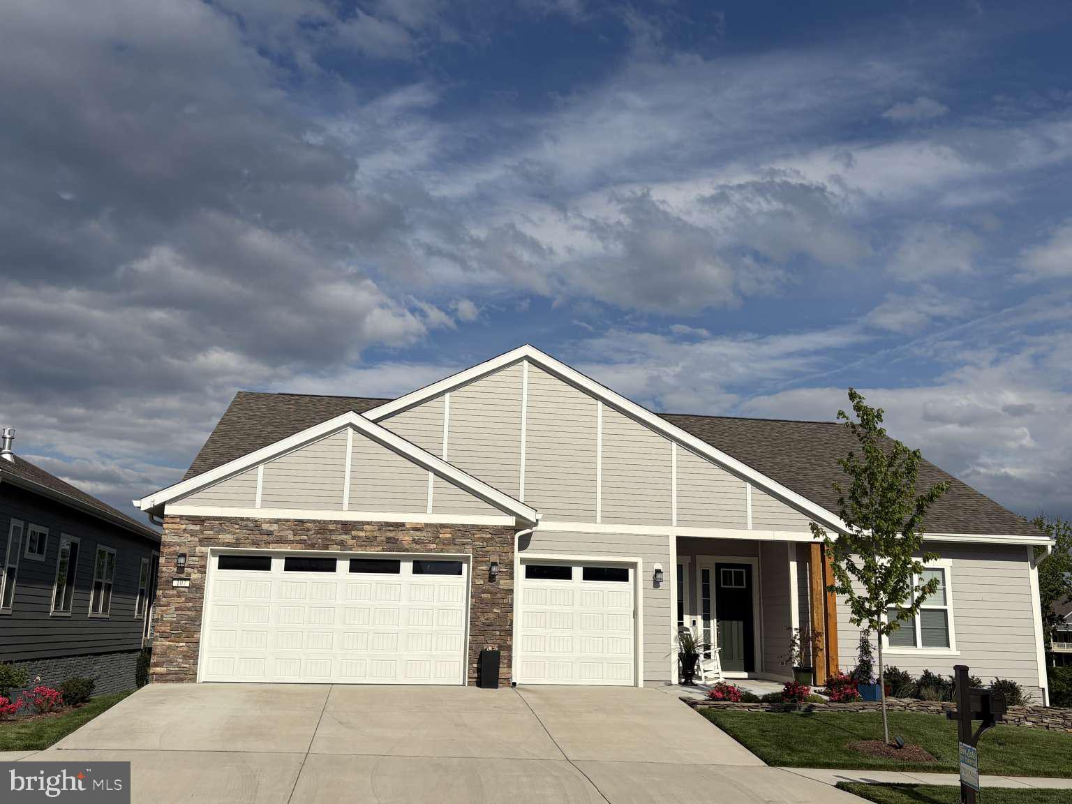 Welcome to Trilogy at Lake Frederick, the area’s premier 55+ gated community featuring amazing amenities including an expansive recreation facility with indoor and outdoor pools, fitness center, tennis and pickleball courts plus the Shenandoah lodge. This Baldwin II model situated on a premium homesite offers 3 bedrooms, 3 full and 2 half bathrooms, a 3-car garage with electric car outlet, main level owners suite, finished walkout lower level, multi-slide back door, and 2 gas fireplaces. The lower level features 2 huge storage rooms, a media room with half bath, 3rd bedroom along with a double bowl sink and shower bathroom, and a huge recreation room. Also, smart home features and irrigation system. Over $333,000 upgrades from builder and added improvements by homeowner which includes all window treatments, extension of deck and patio with screened in covered deck, landscaping, garden wall, water softener, radon system, Sonas sound system, alarm system, cabinets with wire shelving in garage, and whole house repainted.