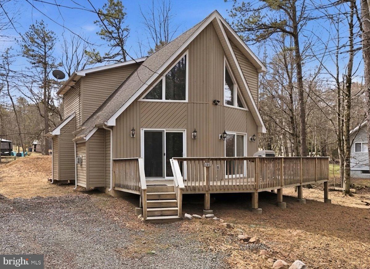Welcome to your Pocono getaway in Towamensing Trails! This charming 3-bedroom, 2-bath home with approximately 1,500 sq ft is tucked on a wooded lot, offering privacy, comfort, and that true mountain escape feel. Warm and inviting interior with a functional layout, perfect for relaxing or entertaining after a day of outdoor adventure. Ideal as a primary home, second home, or investment property. Located in a short-term rental-friendly community (with registration), this is a fantastic Airbnb opportunity. Towamensing Trails features a 190-acre lake, beach, pool, marina, tennis courts, and clubhouse, making it highly attractive for both personal use and guests. Minutes to historic Jim Thorpe, Lake Harmony, Big Boulder, Jack Frost, hiking, and year-round Pocono attractions. Property is being sold in as-is condition.