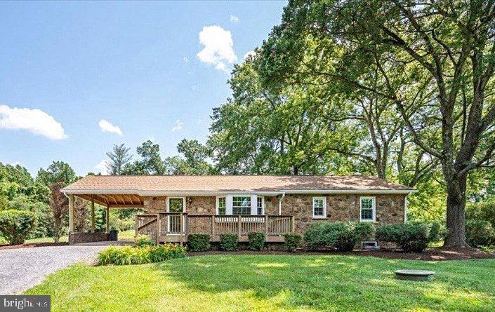Don't miss this beautifully updated stone home on a stunning 2-acre lot! Thoughtfully renovated from top to bottom with high-end finishes, this rare property perfectly blends timeless charm with modern updates. Major systems—including the roof, HVAC, and water heater—are all less than five years old, offering peace of mind for years to come. Enjoy the freedom of no HOA in a picturesque setting with plenty of space to relax and entertain.